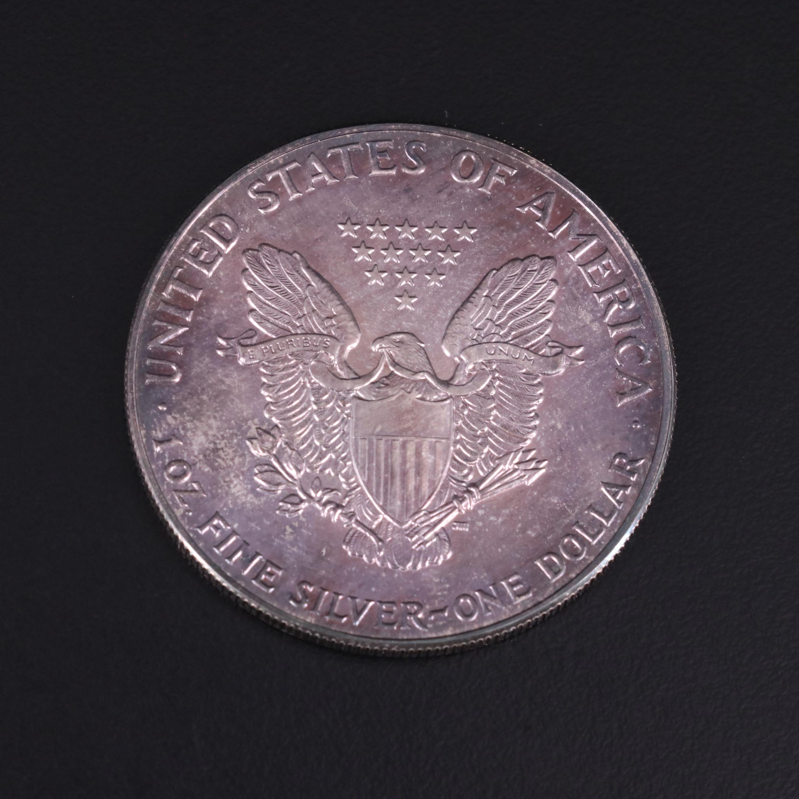 Small Collection of U.S. Coins With a 1987 Silver Eagle