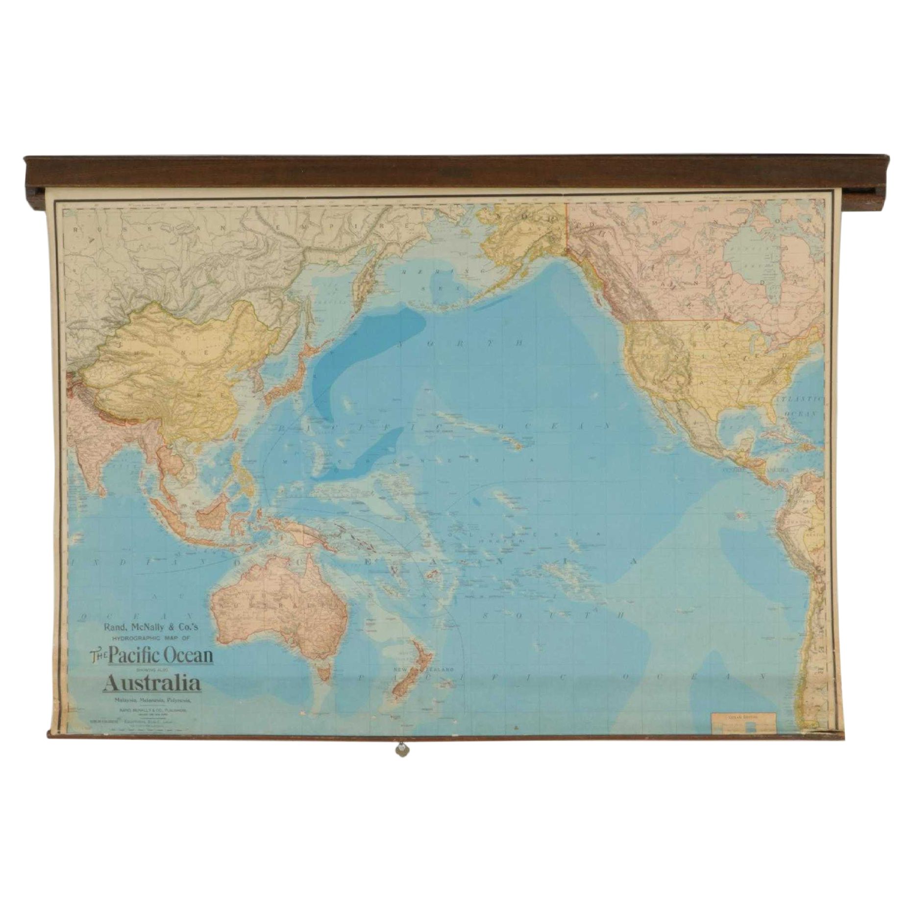 Retractable Rand McNally Wall Map of Pacific Ocean and Australia in Casing, 1904