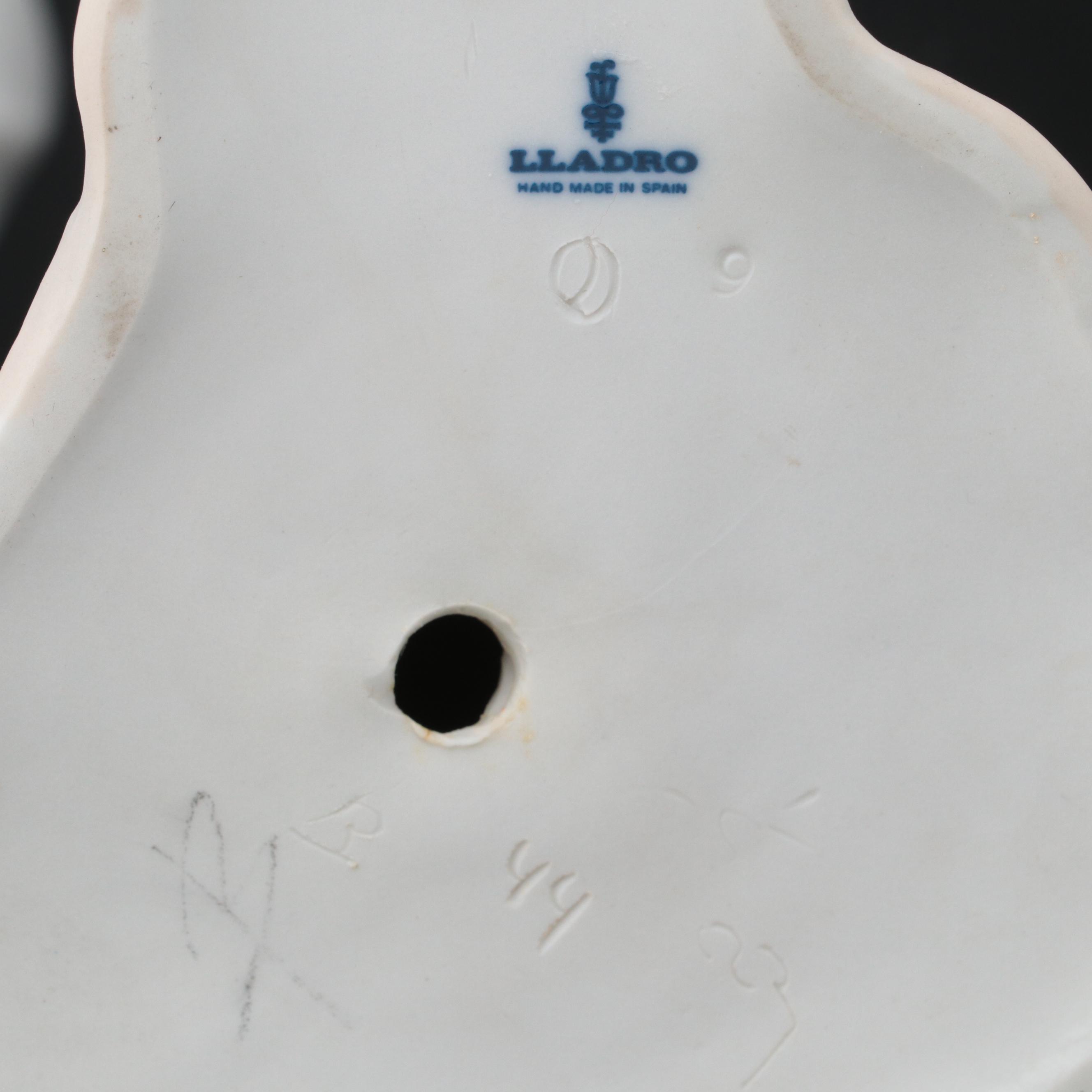 Lladró "Girl with Lamb" and "Girl Gathering Flowers" Porcelain Figurines