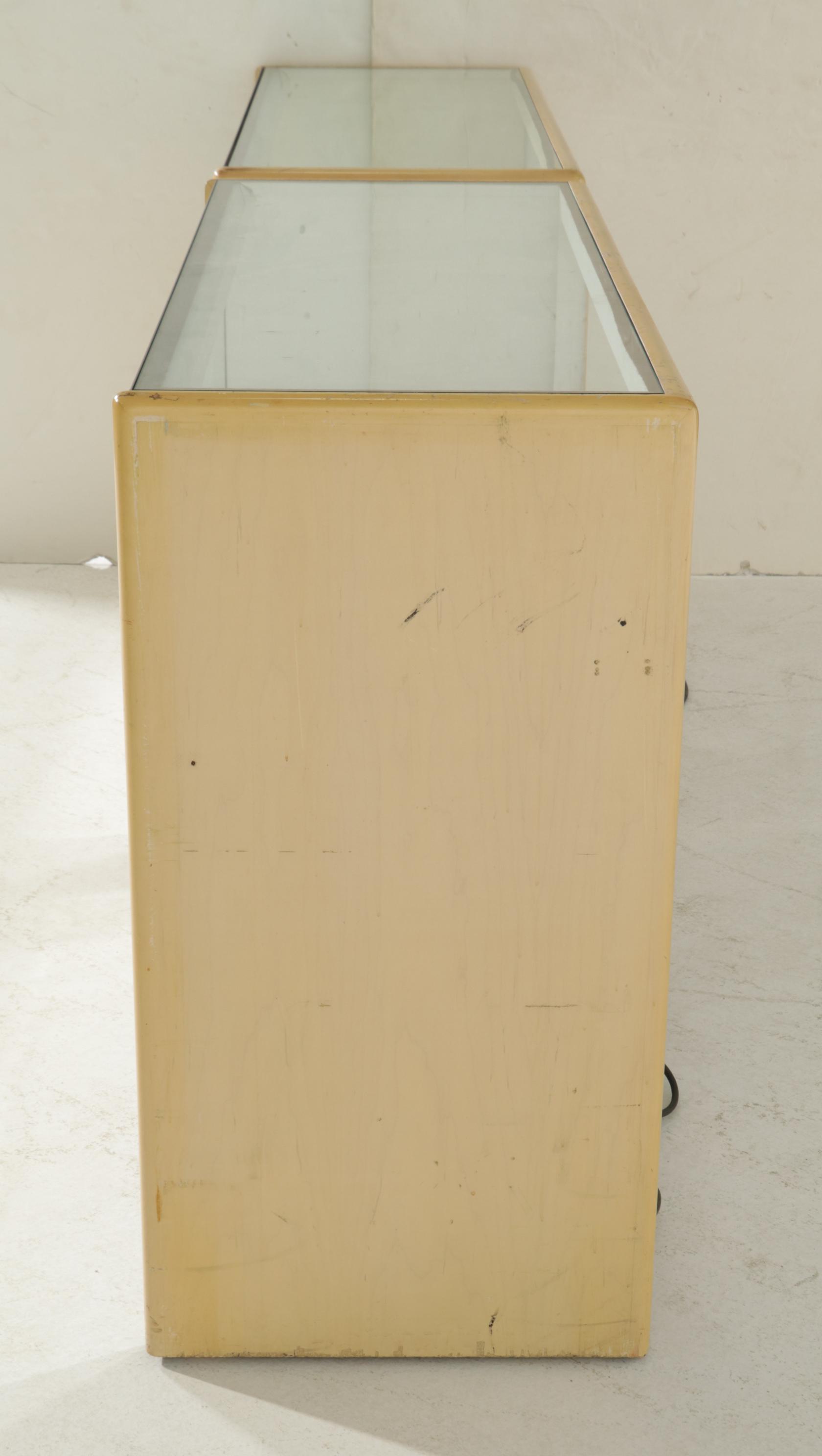 Two Modernist Lacquered Wood and Glass Retail Display Cases