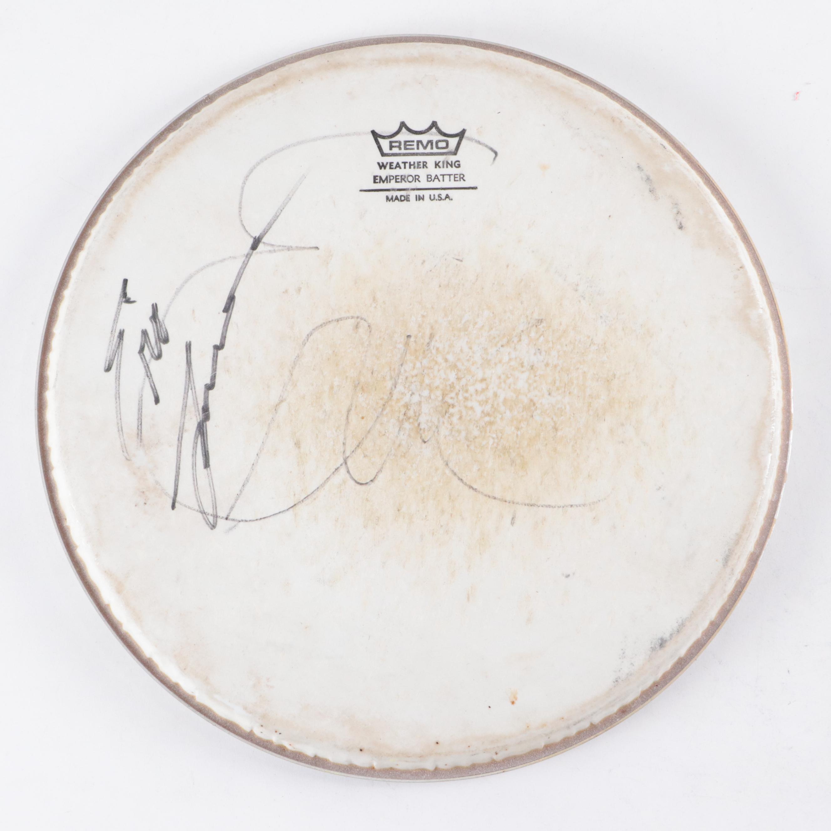 Autographed and More Remo Drum Heads With Hide Covered Wooden Drum