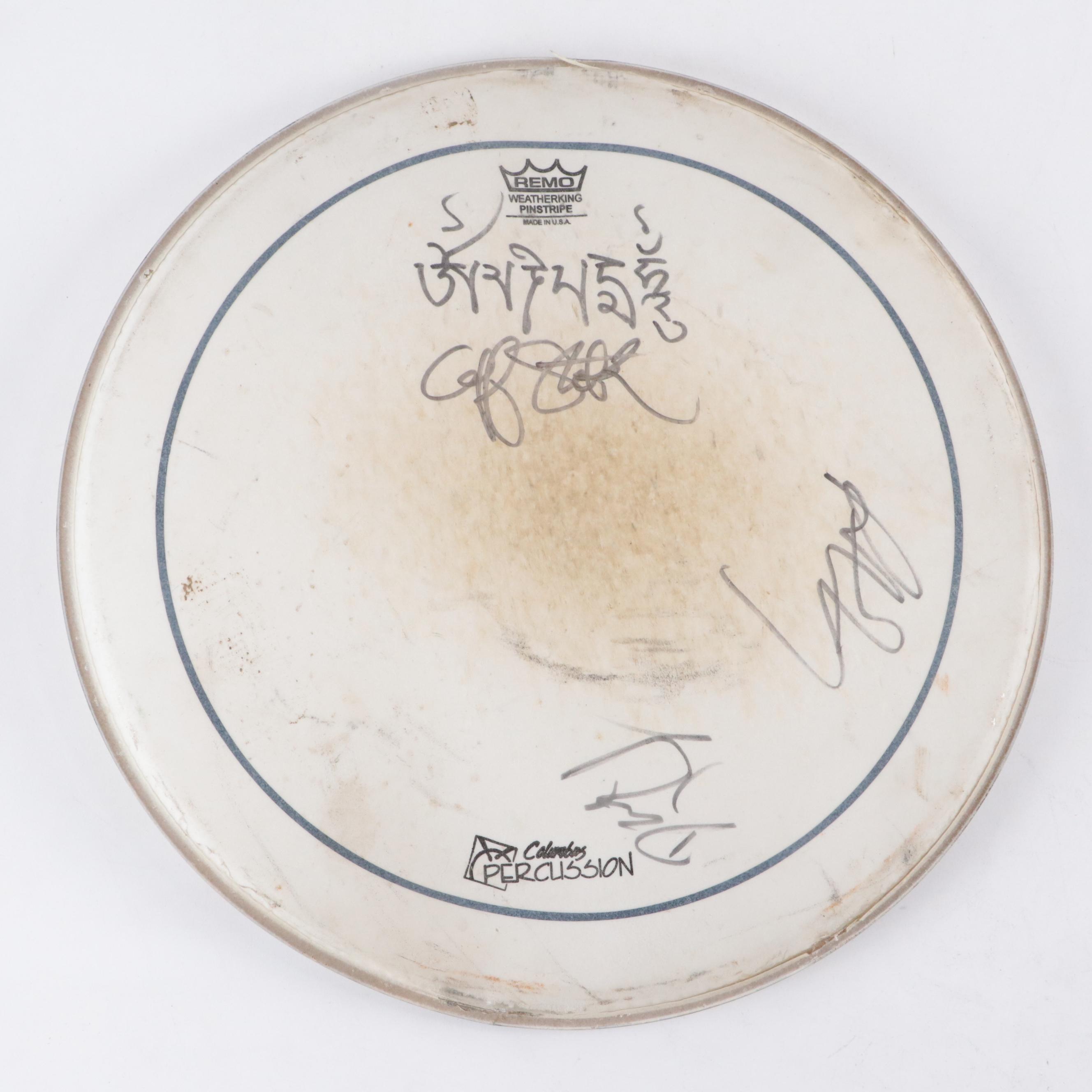 Autographed and More Remo Drum Heads With Hide Covered Wooden Drum