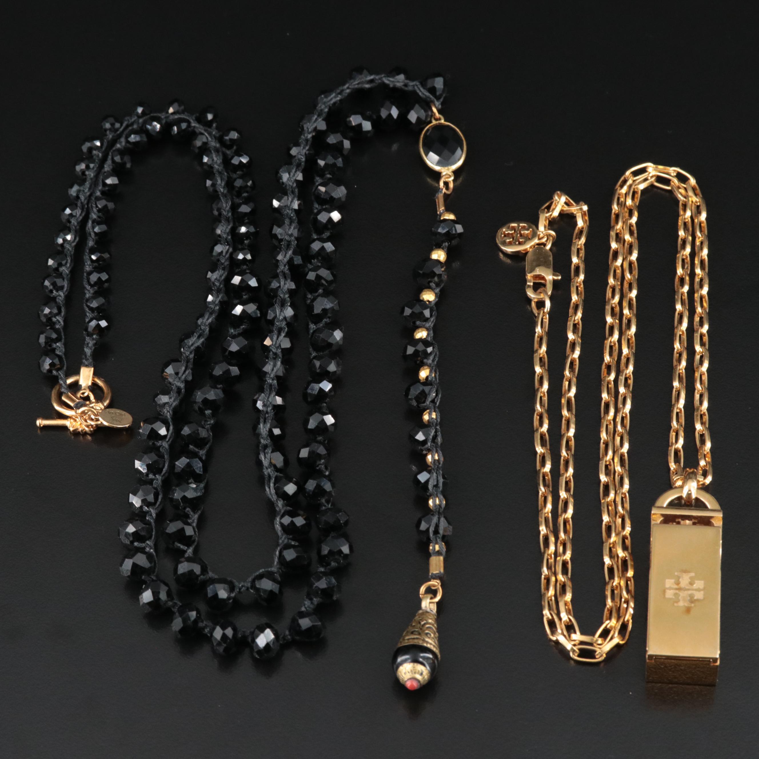 An Old Soul Crocheted Crystal Necklace and a Tory Burch Necklace for Fitbit