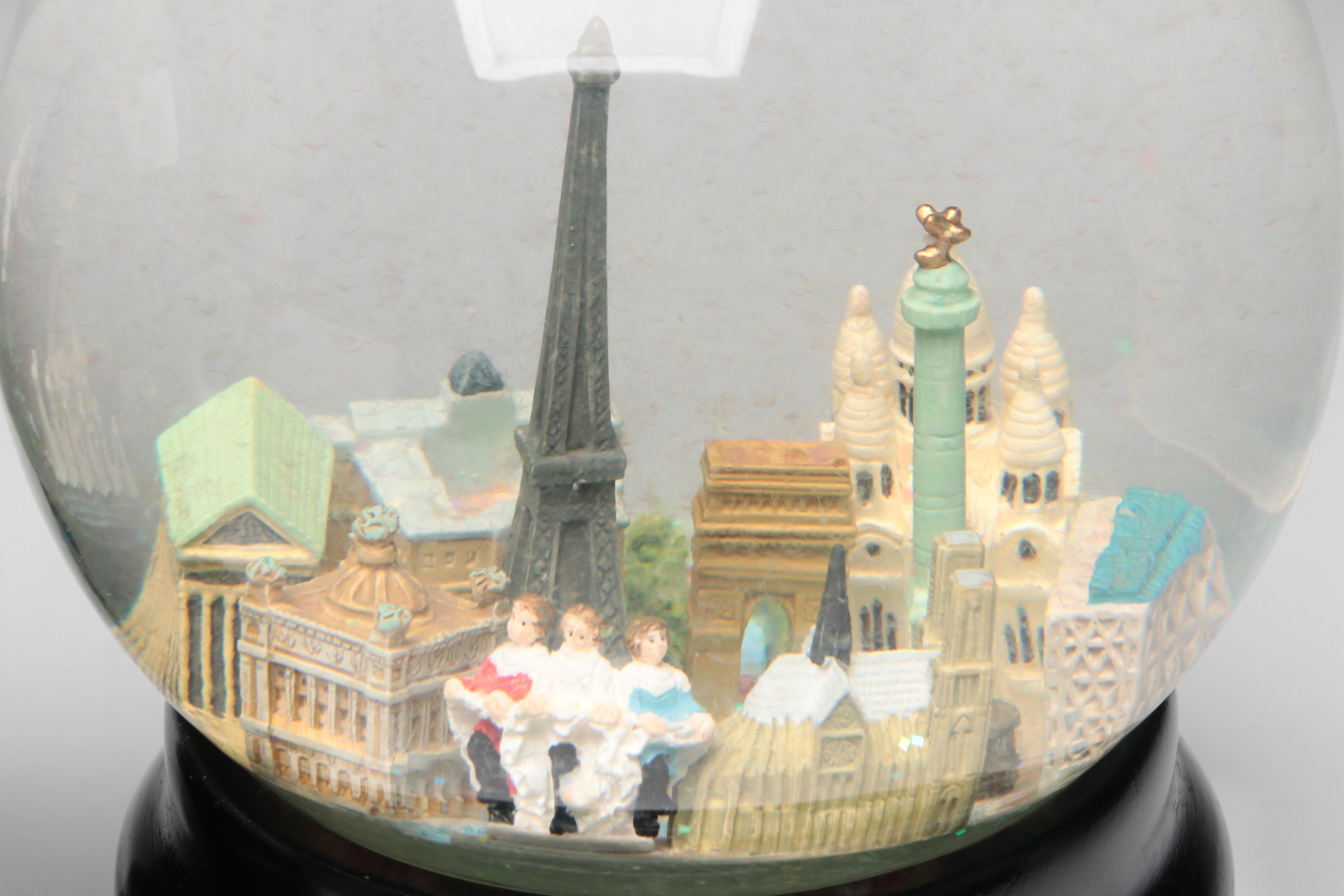 Saks Fifth Avenue and Three Jays Imports City Musical Snow Globe Collection