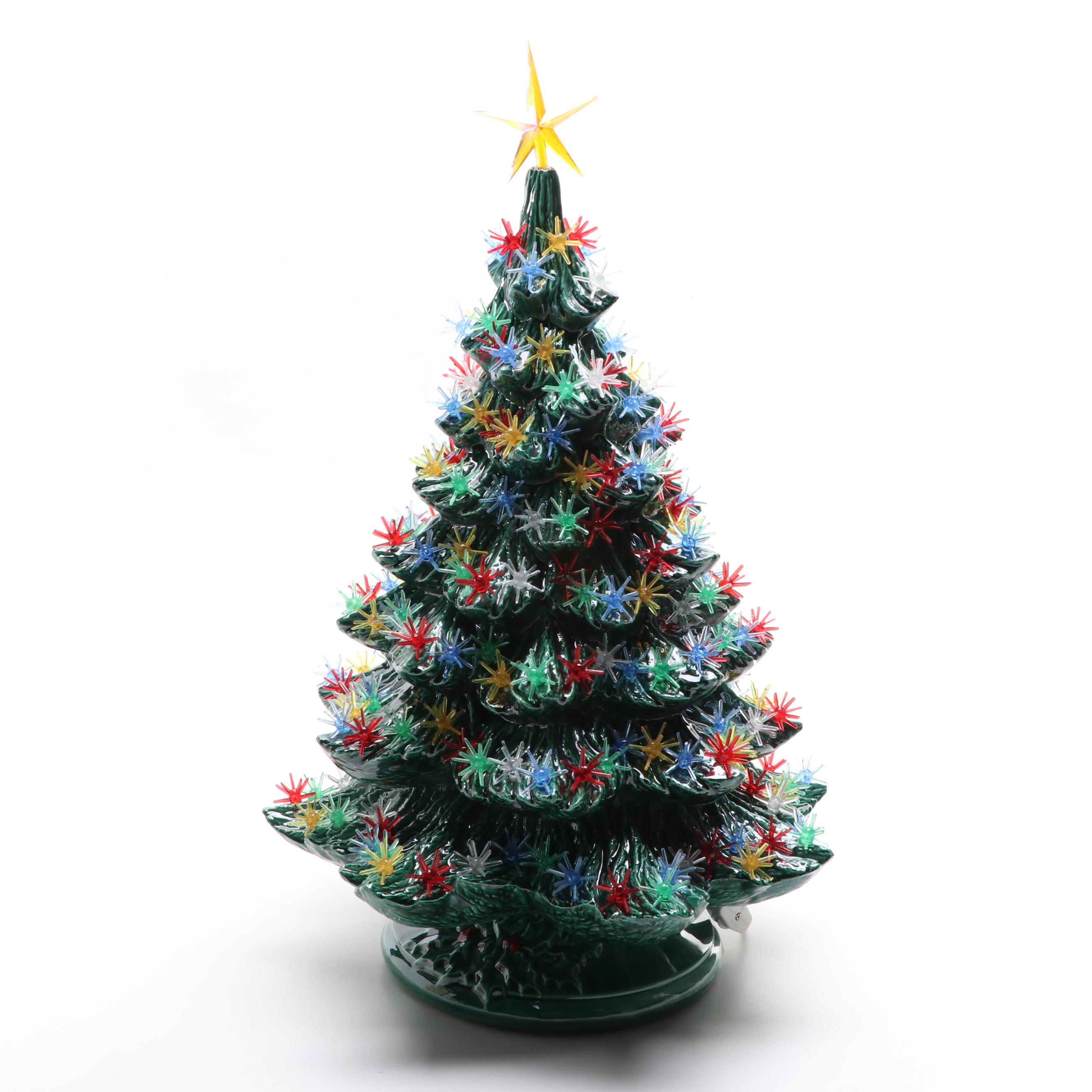 Decorated Christmas Tree, Santa Oil Lamp, and More Seasonal Décor