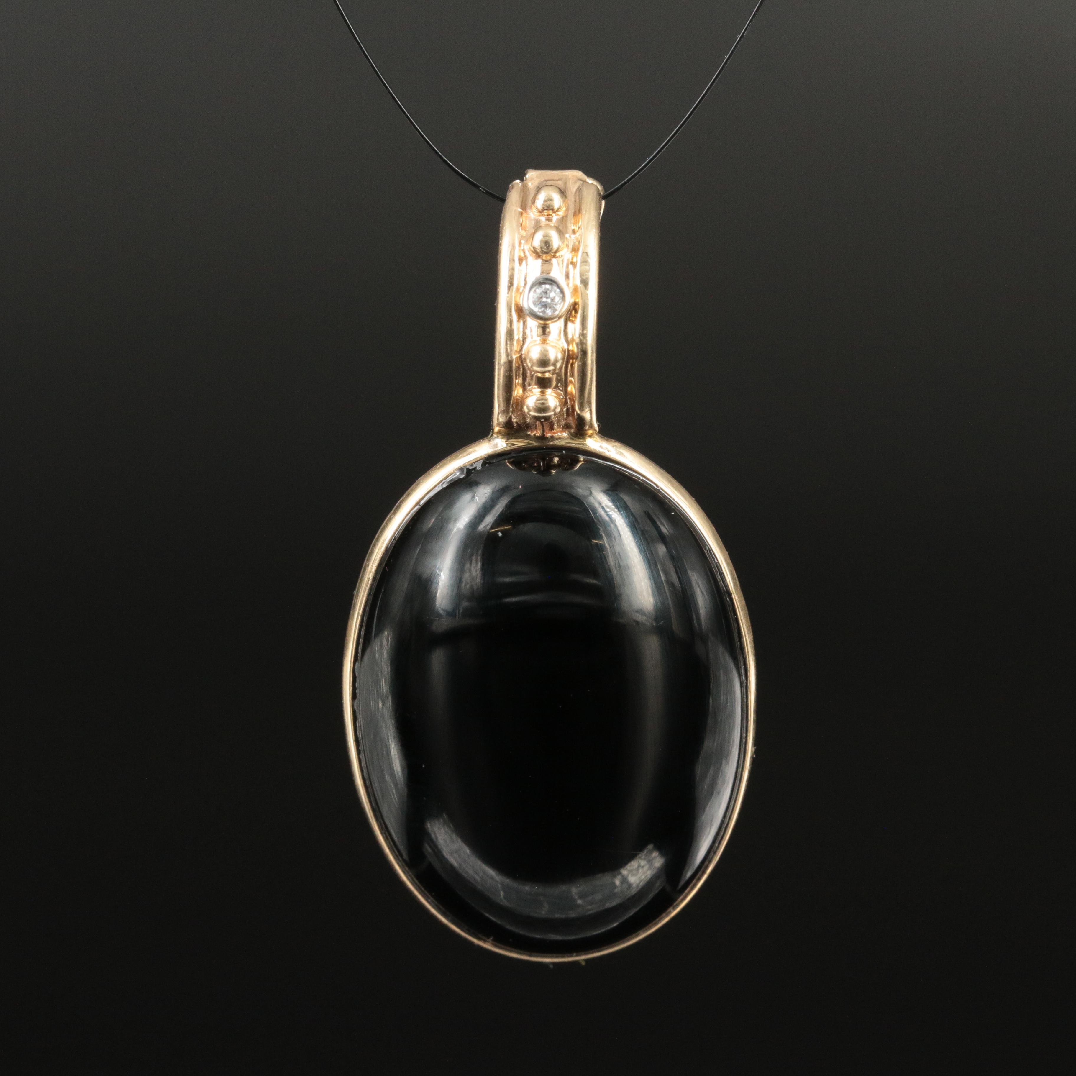 14K Black Onyx and Diamond Pendant