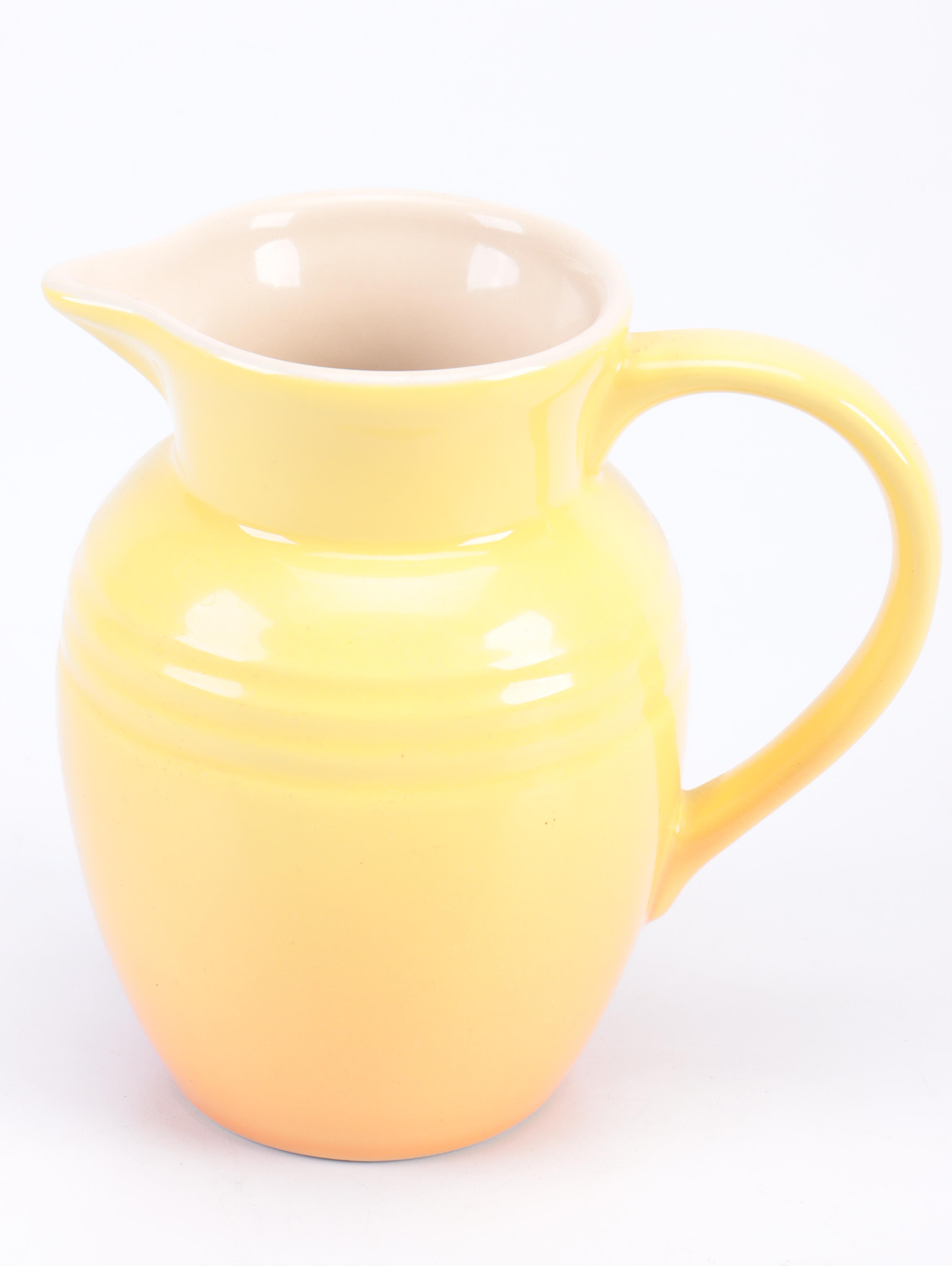 Le Creuset Enameled Cast Iron Dutch Oven with Trivet and Stoneware Pitcher