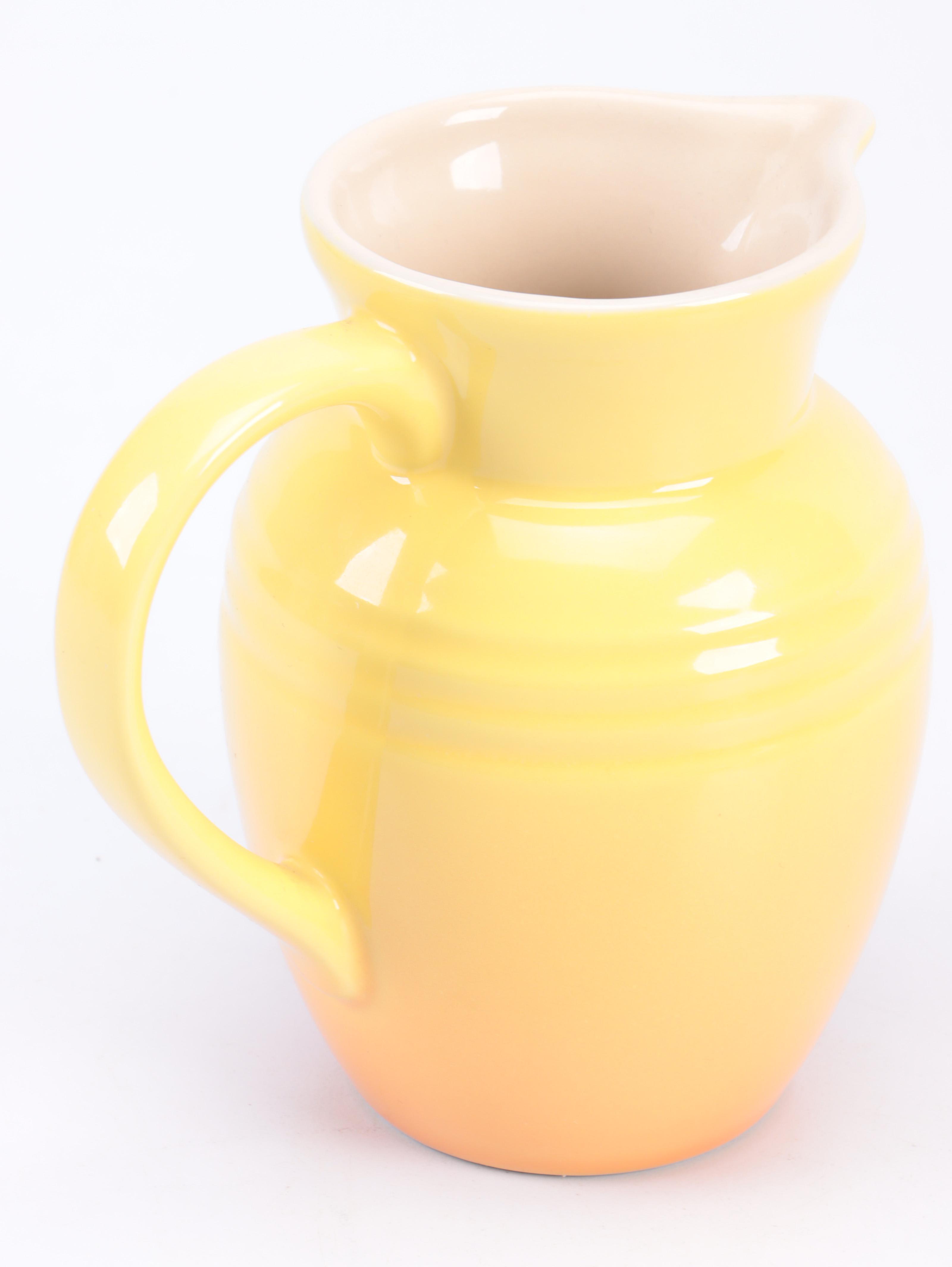 Le Creuset Enameled Cast Iron Dutch Oven with Trivet and Stoneware Pitcher