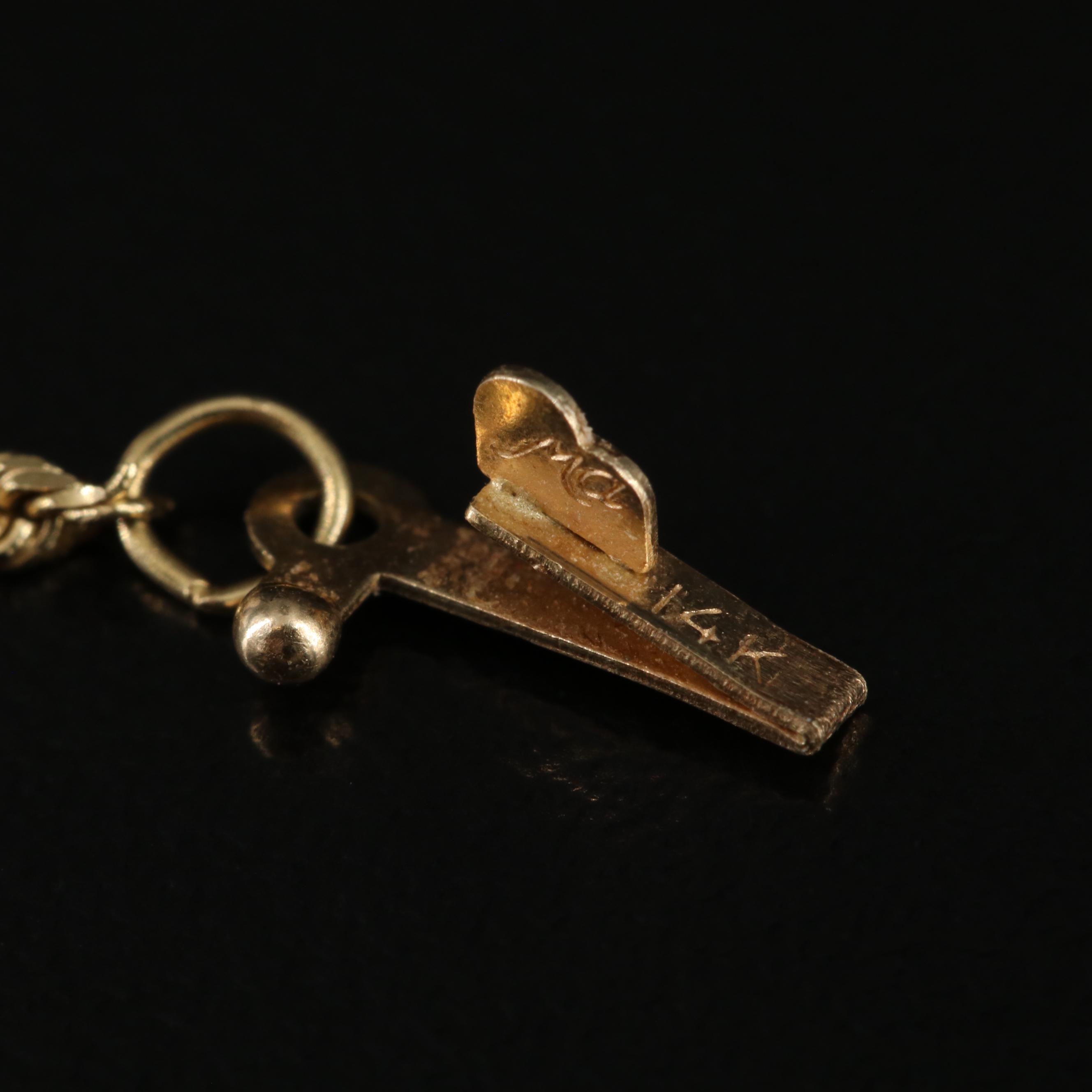 10K Ruby Pendant on a 14K Rope Chain