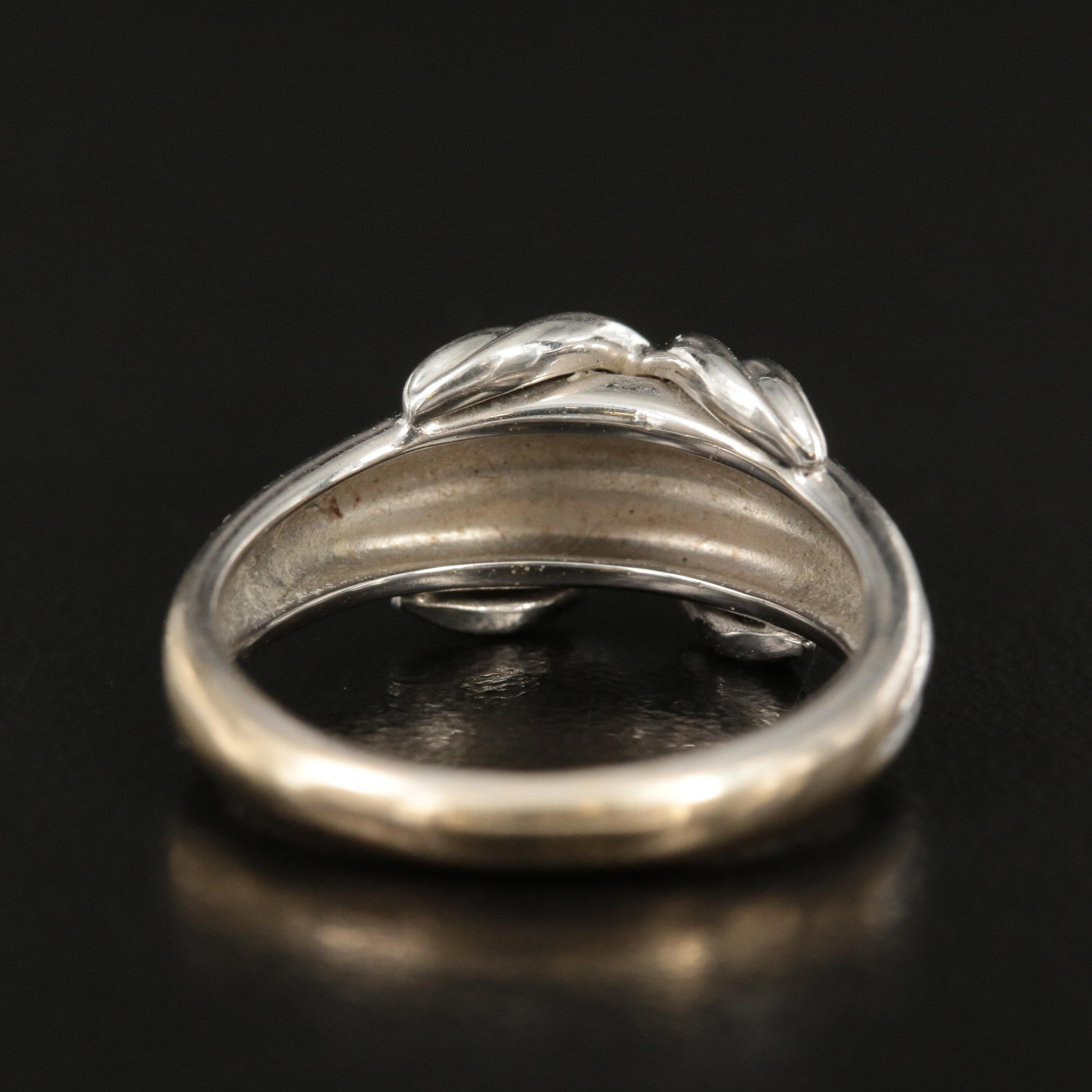 Tiffany & Co. "Signature X" 18K Ring