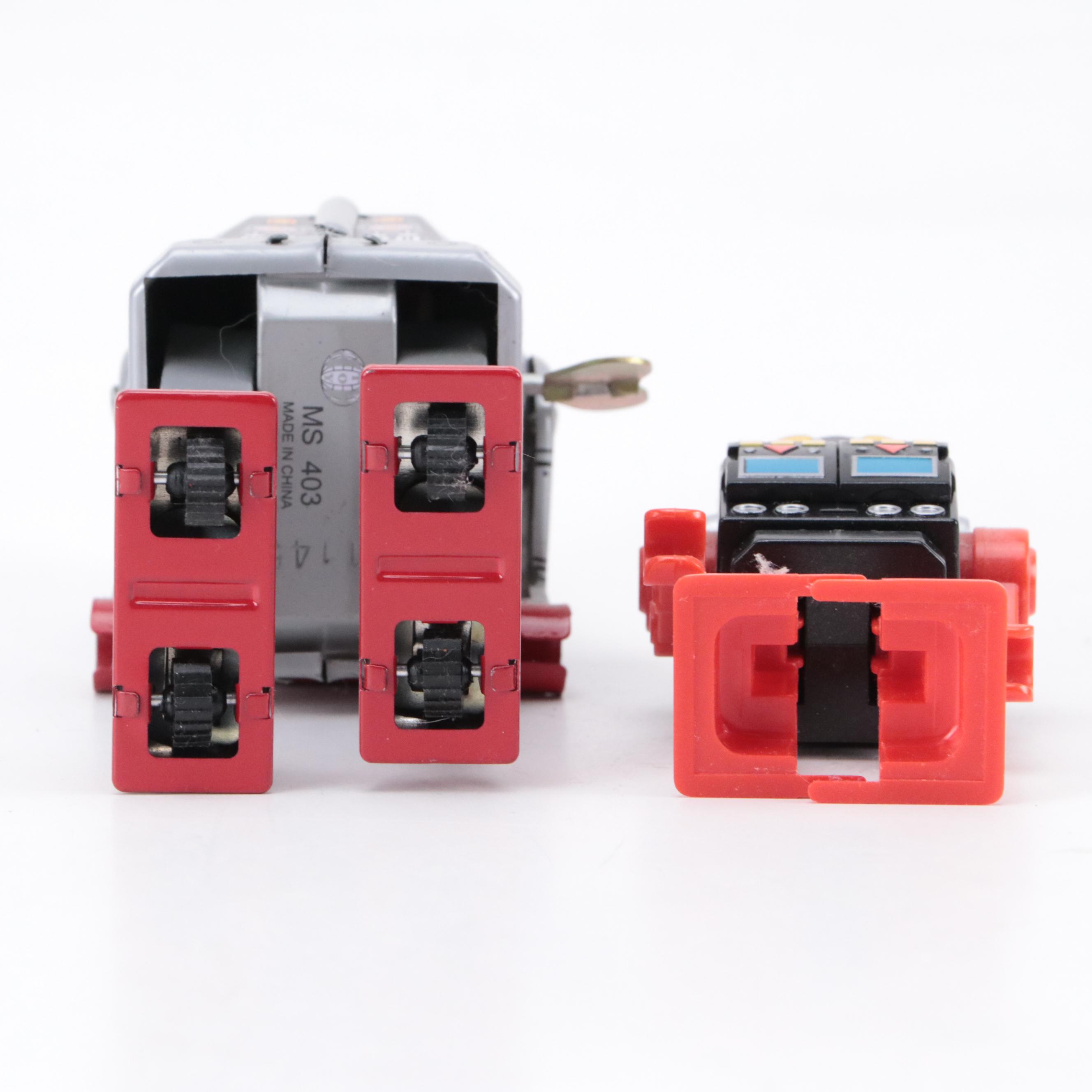 Wind-Up Tin Lithograph Toy Robots with Alien Walker, Late 20th/ Early 21st C.