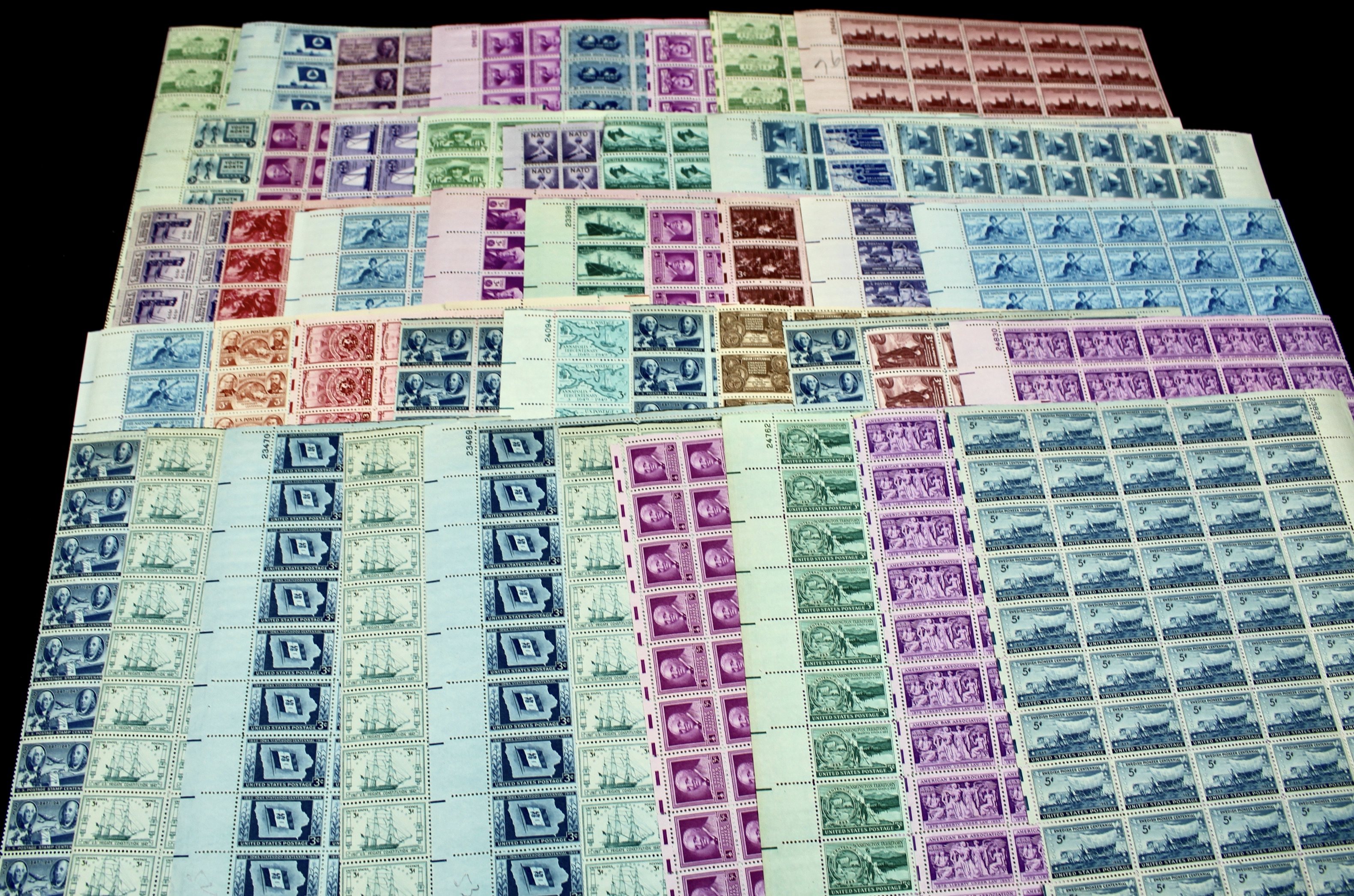 Grouping of 71 Full Postage Stamp Sheets