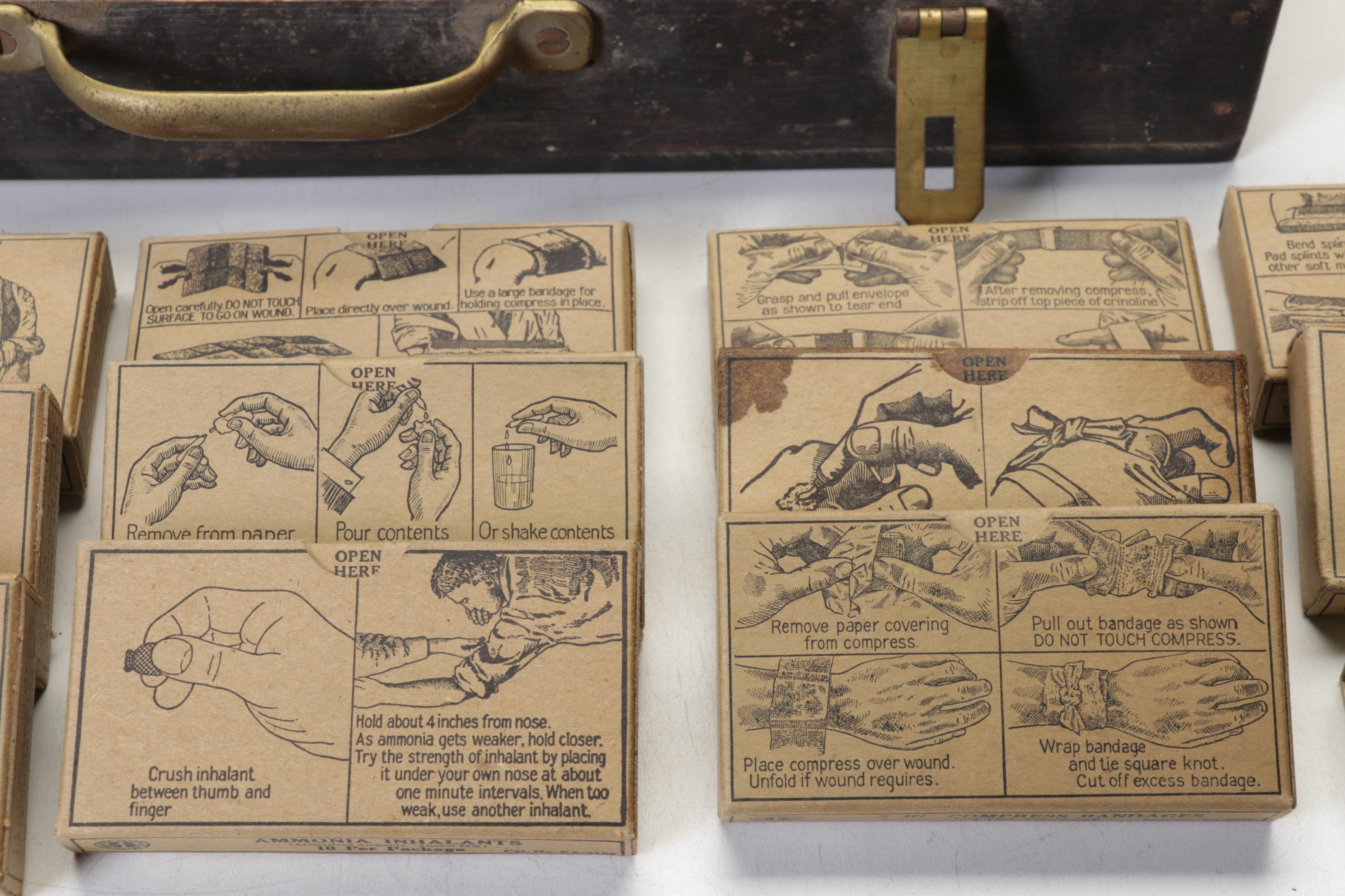 WWII First Aid Supplies with Wooden Case and U.S. Civil Defense Manuals