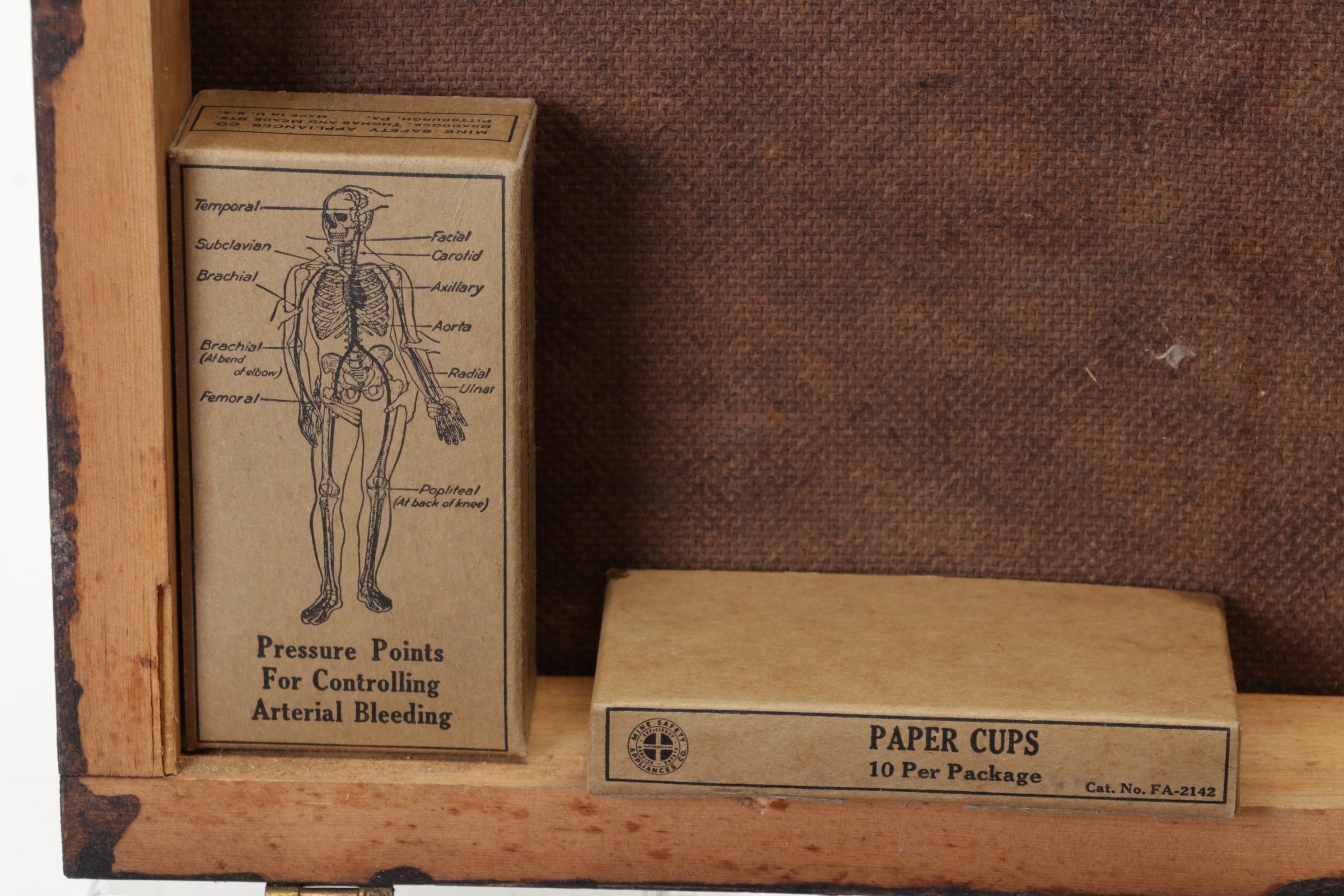 WWII First Aid Supplies with Wooden Case and U.S. Civil Defense Manuals