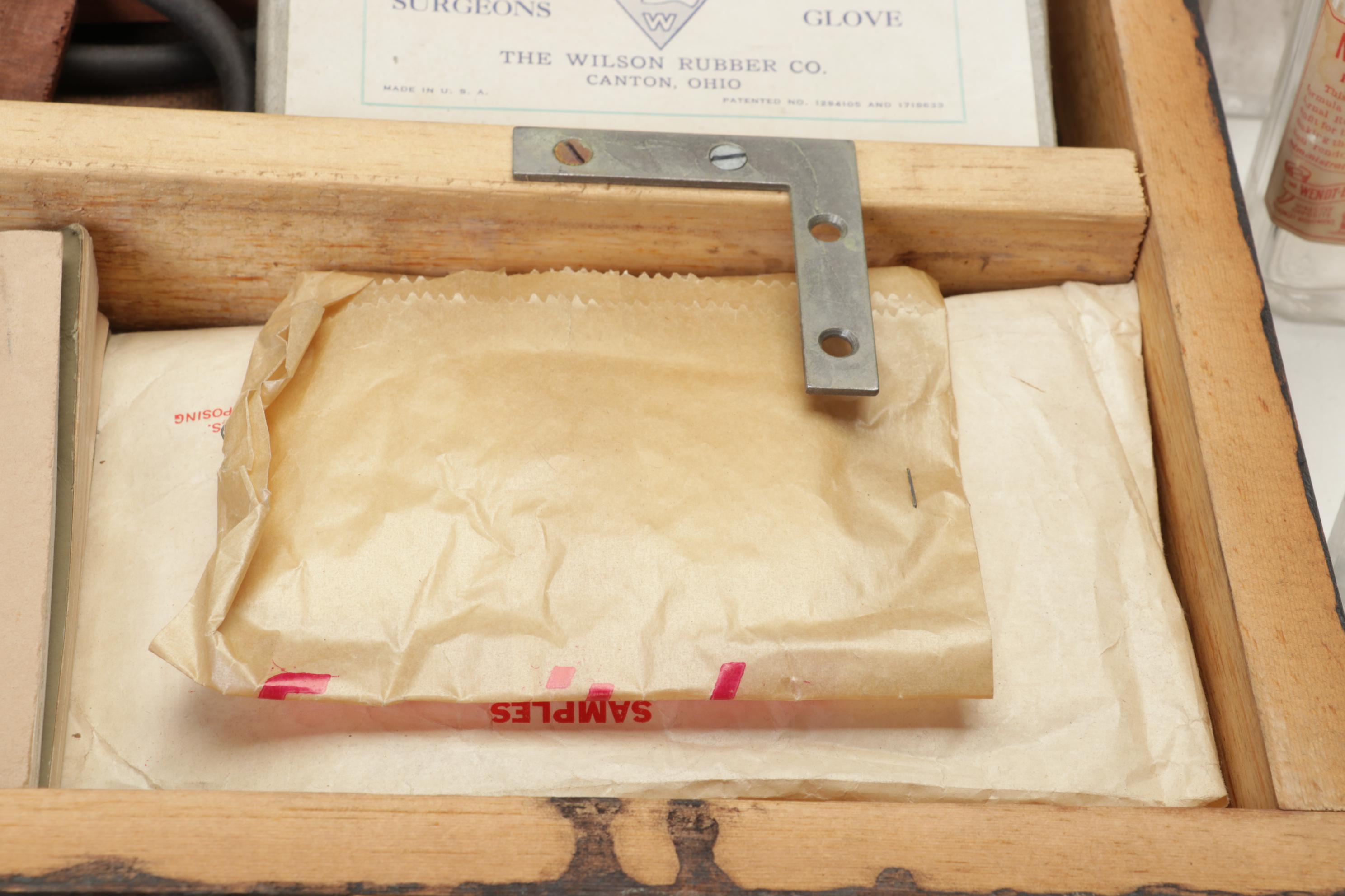 WWII First Aid Supplies with Wooden Case and U.S. Civil Defense Manuals