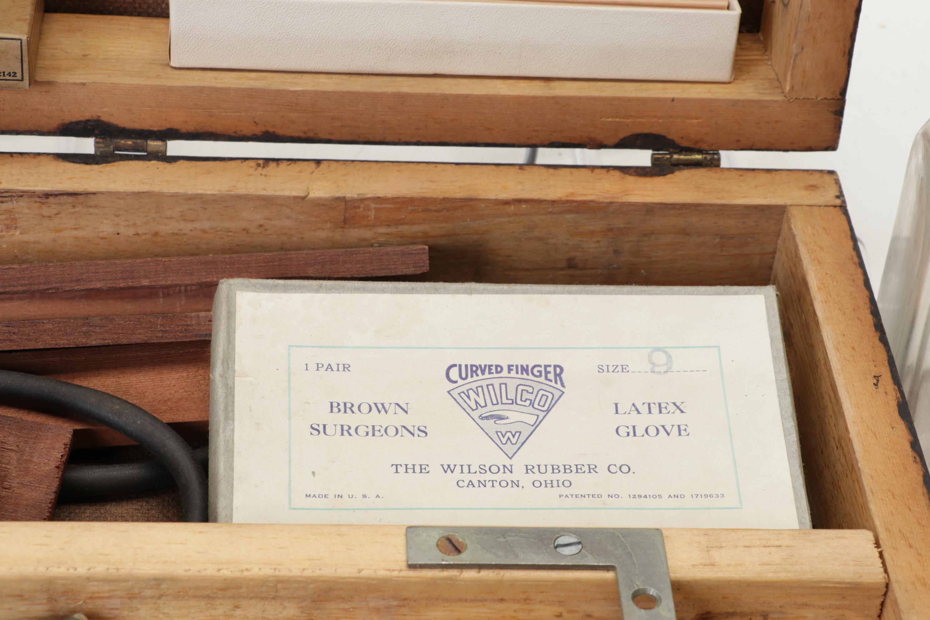 WWII First Aid Supplies with Wooden Case and U.S. Civil Defense Manuals