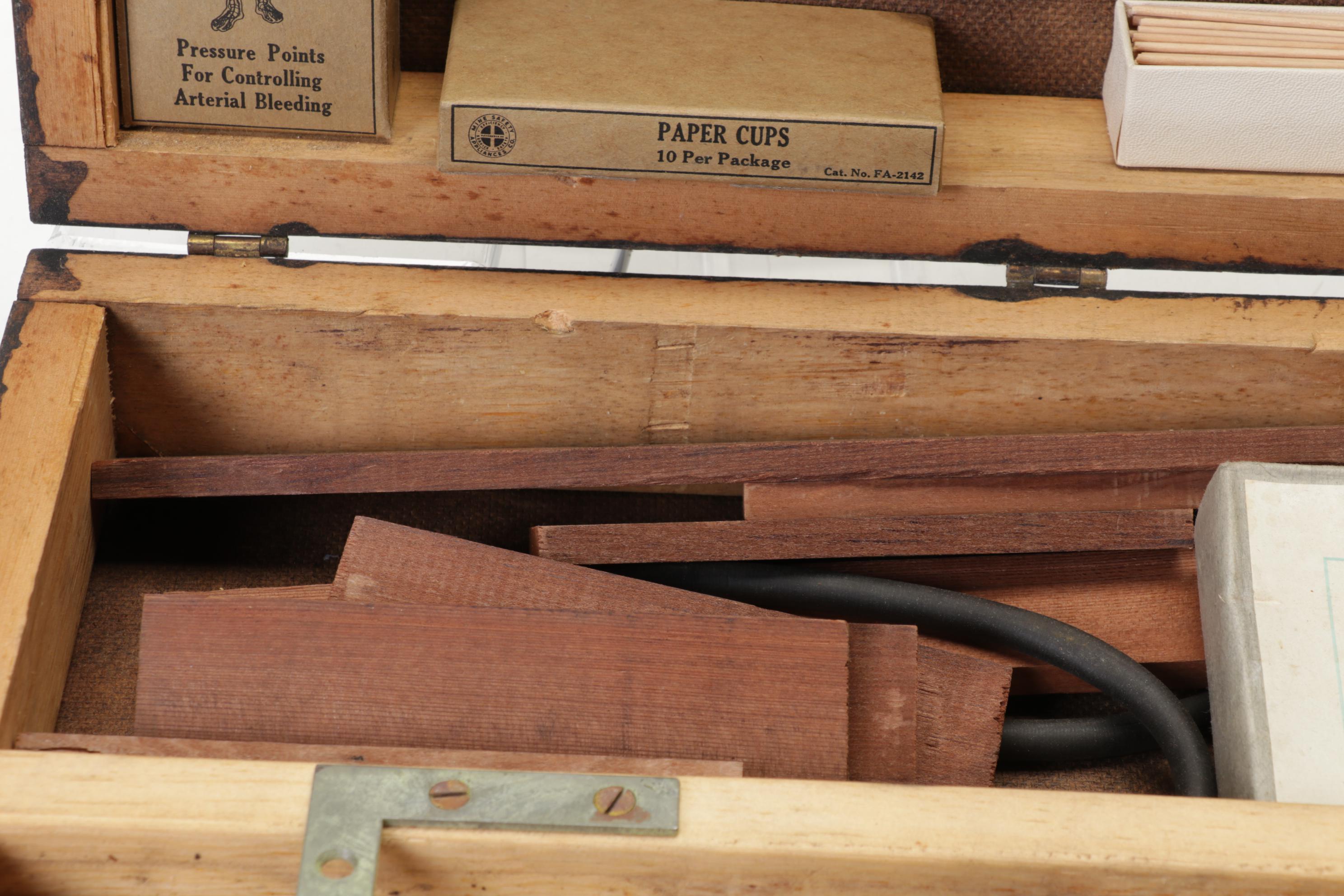 WWII First Aid Supplies with Wooden Case and U.S. Civil Defense Manuals