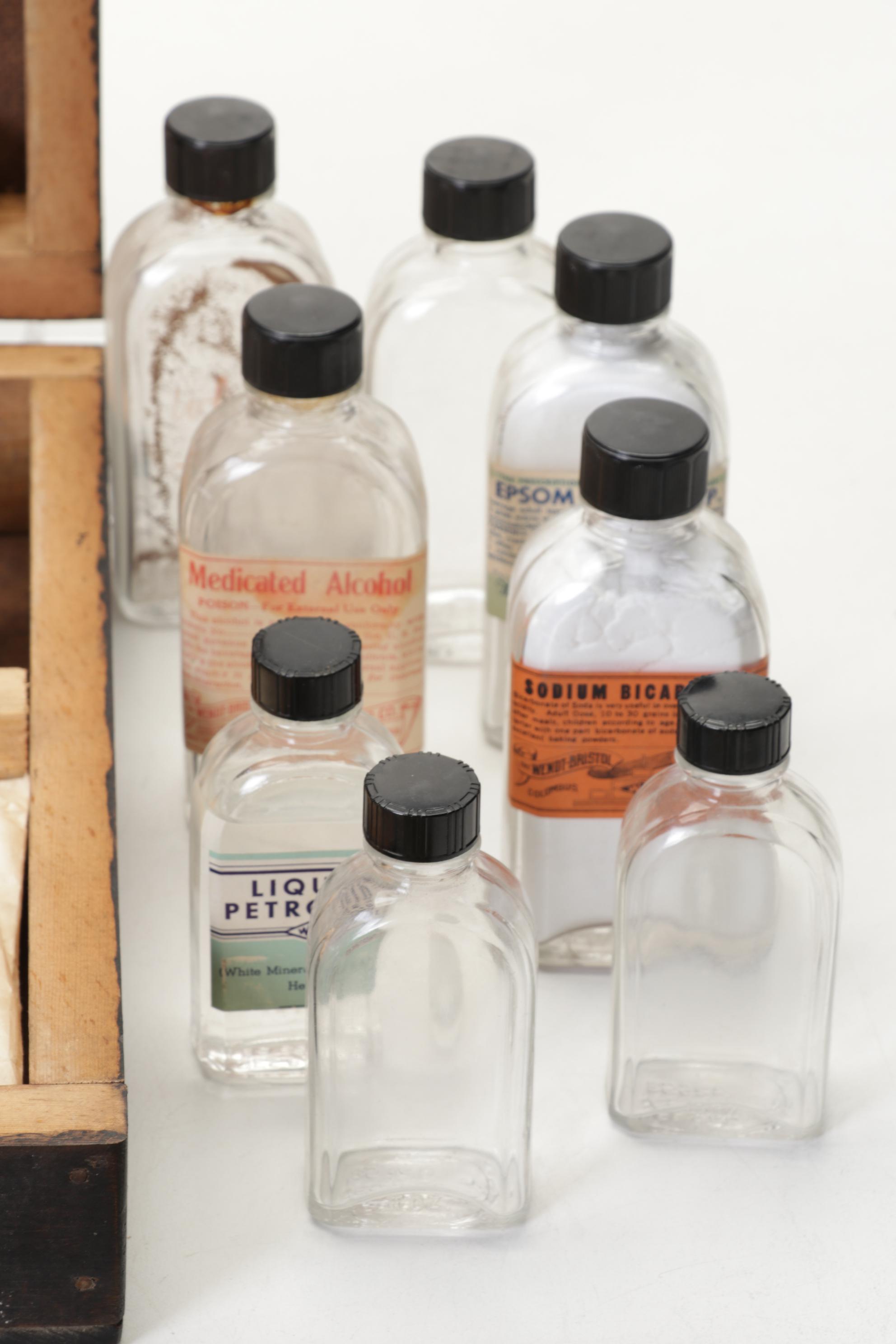 WWII First Aid Supplies with Wooden Case and U.S. Civil Defense Manuals