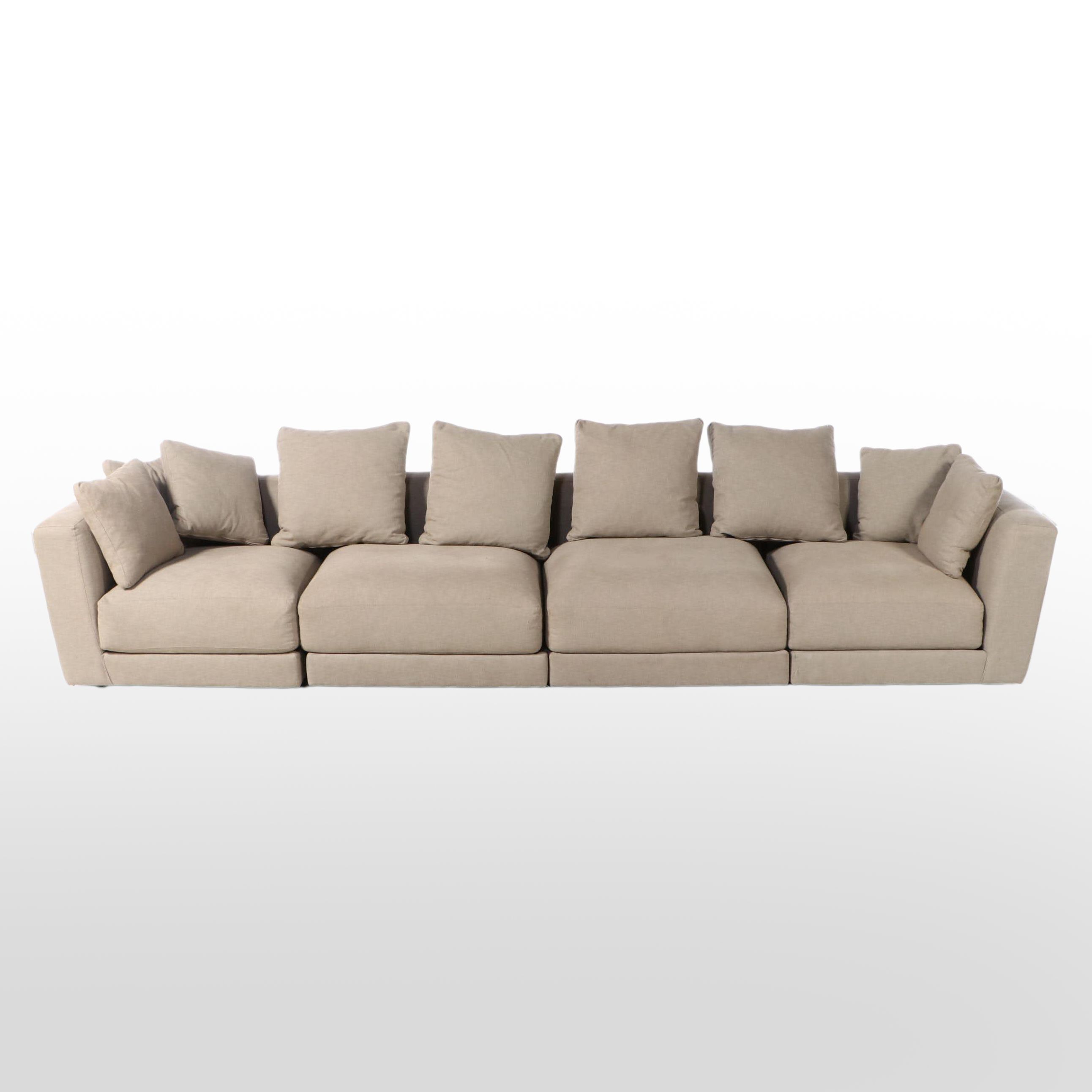 Contemporary Taupe Fabric Upholstered Four-Piece Sectional Sofa