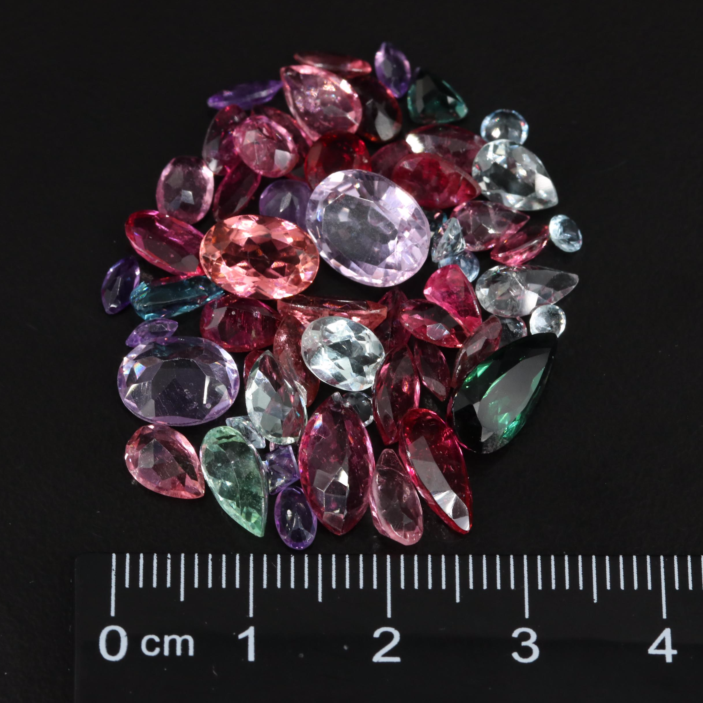 Loose 31.28 CTW Gemstones Including Amethyst, Tourmaline and Sapphire
