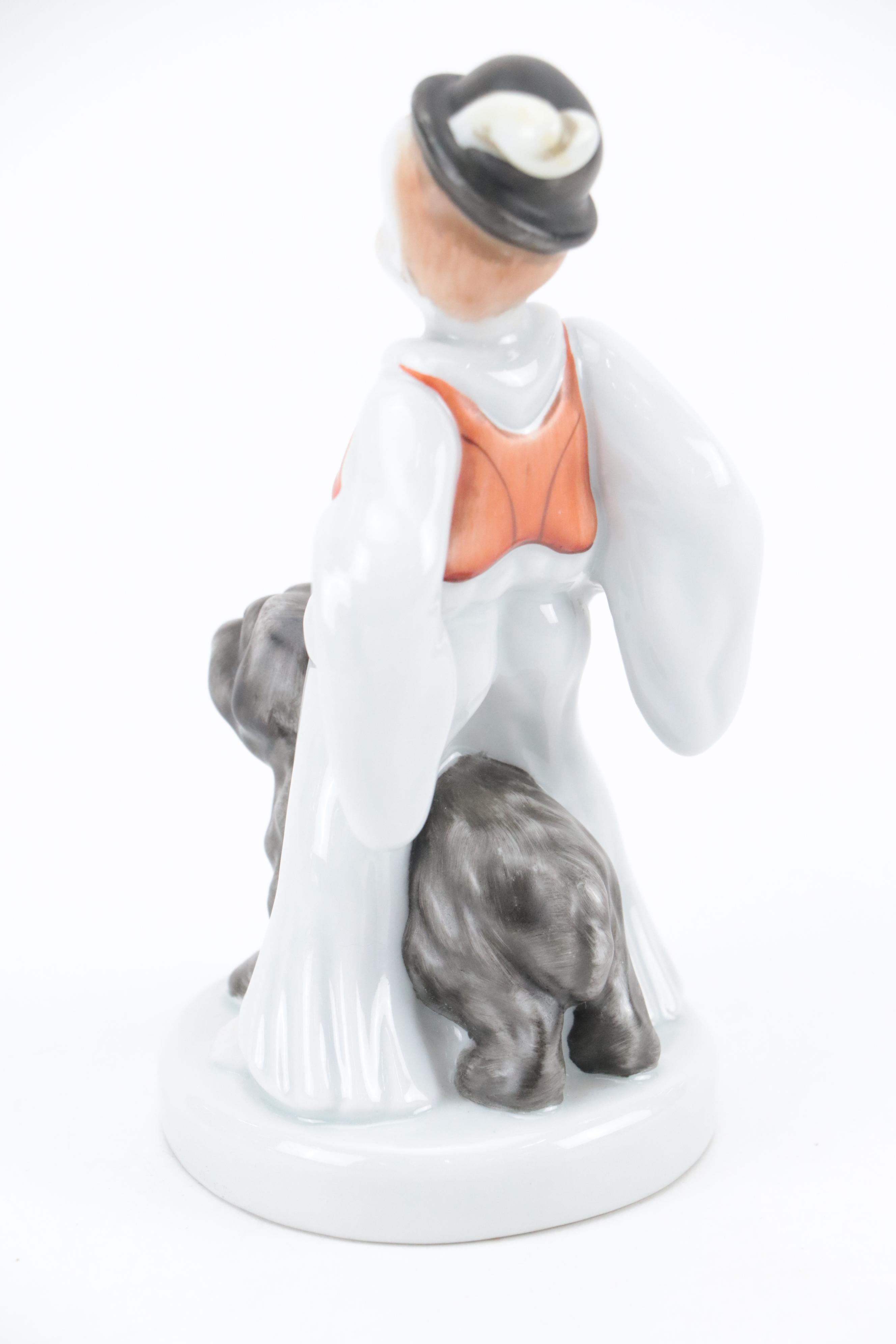 Herend "Man Eating Grapes" and "Boy with Puli Dog" Porcelain Figurines