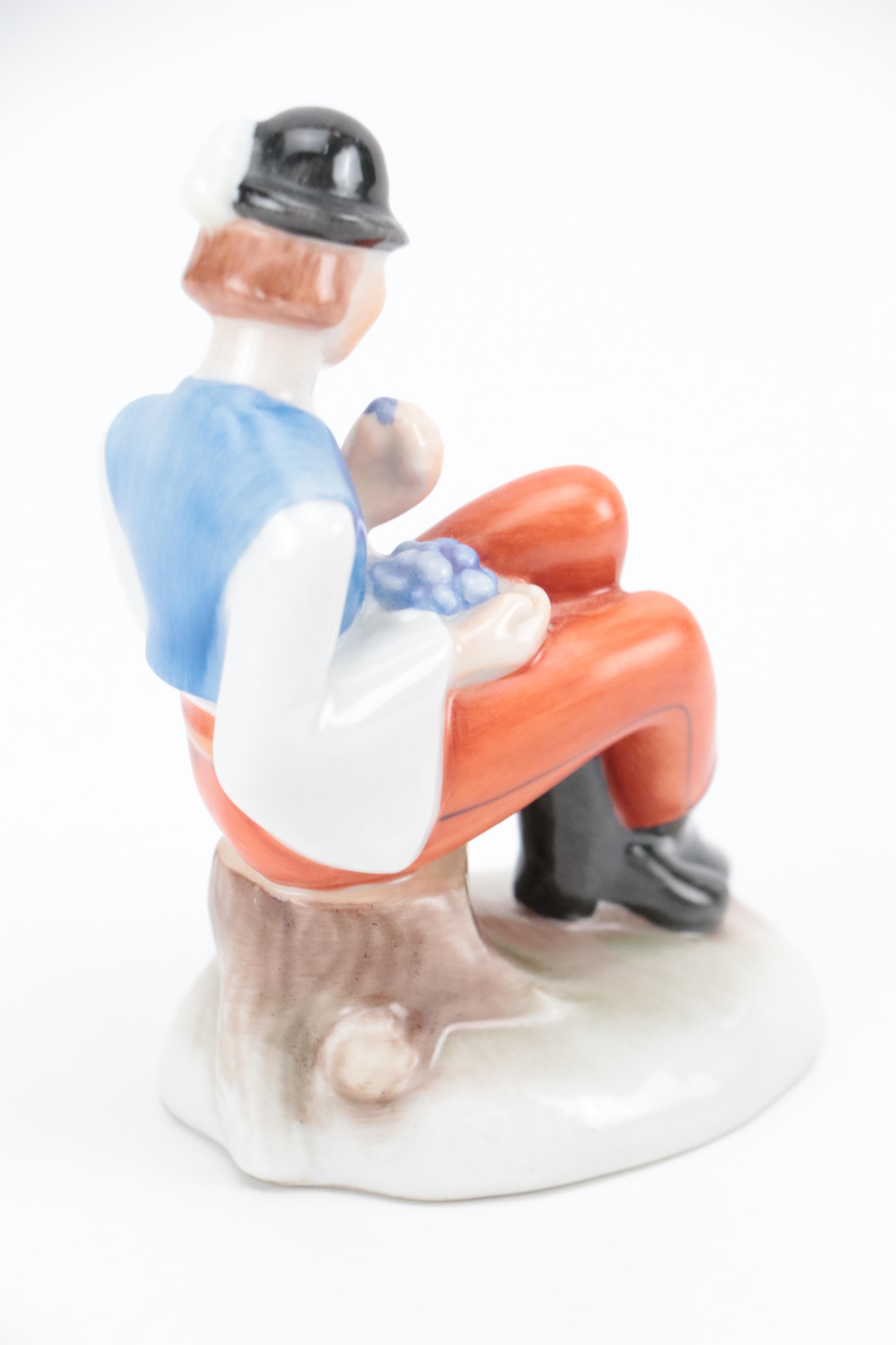 Herend "Man Eating Grapes" and "Boy with Puli Dog" Porcelain Figurines