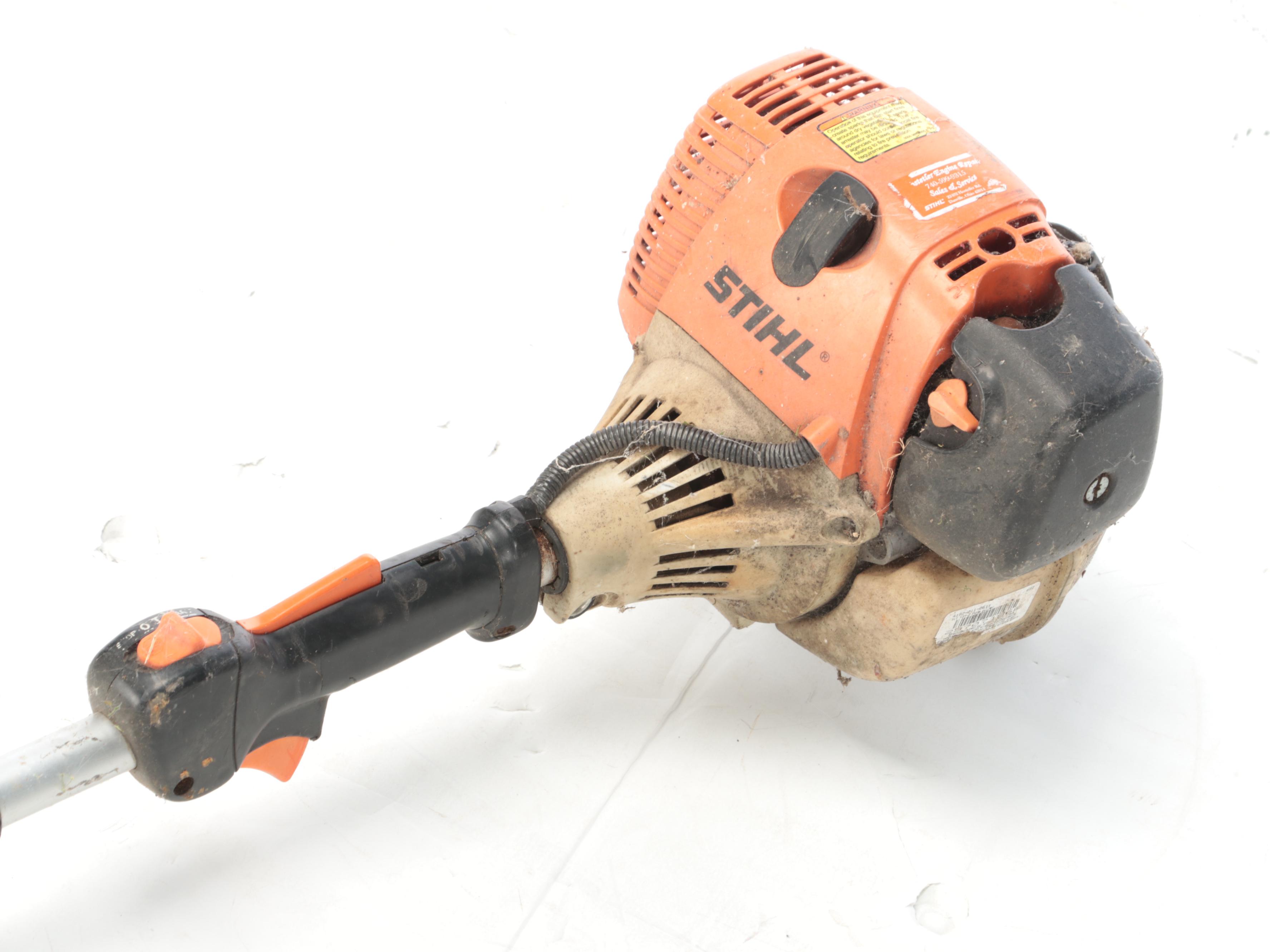 Stihl Pole Top Chainsaw Pruner with Post Hole Diggers and Garden Shovels