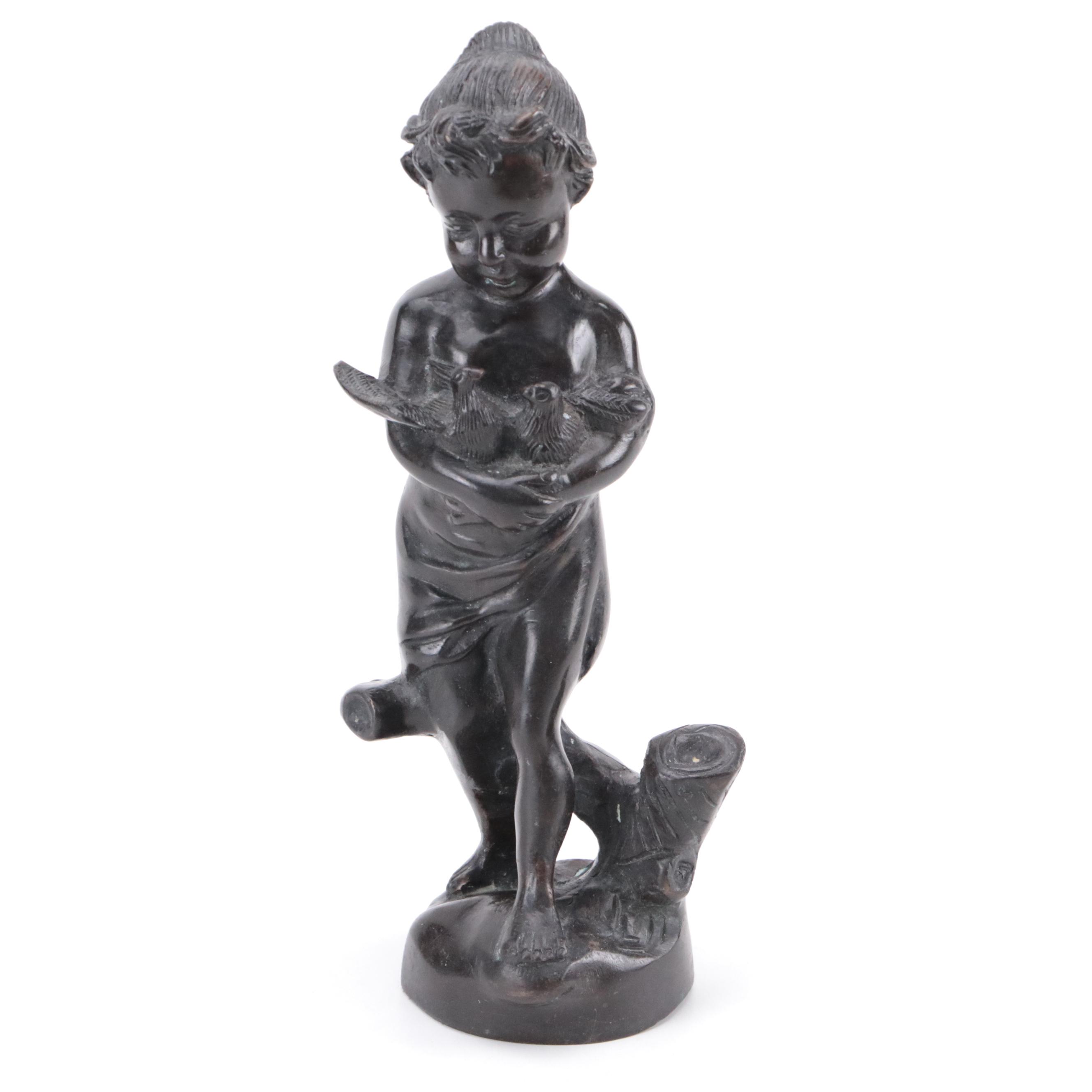 Bronze Sculpture of a Child Holding Birds
