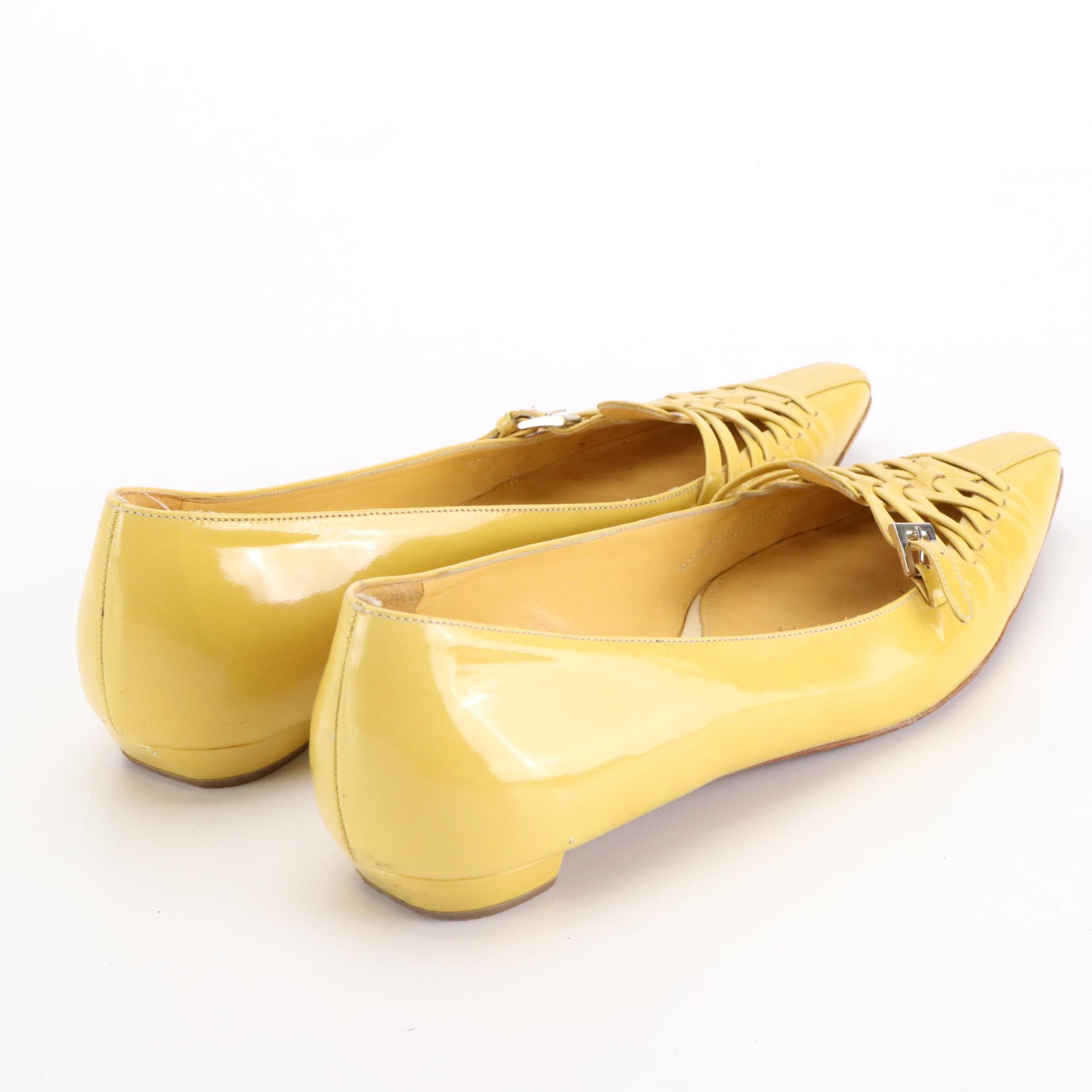 Prada Criss-Cross Detail Flats in Yellow Patent Leather