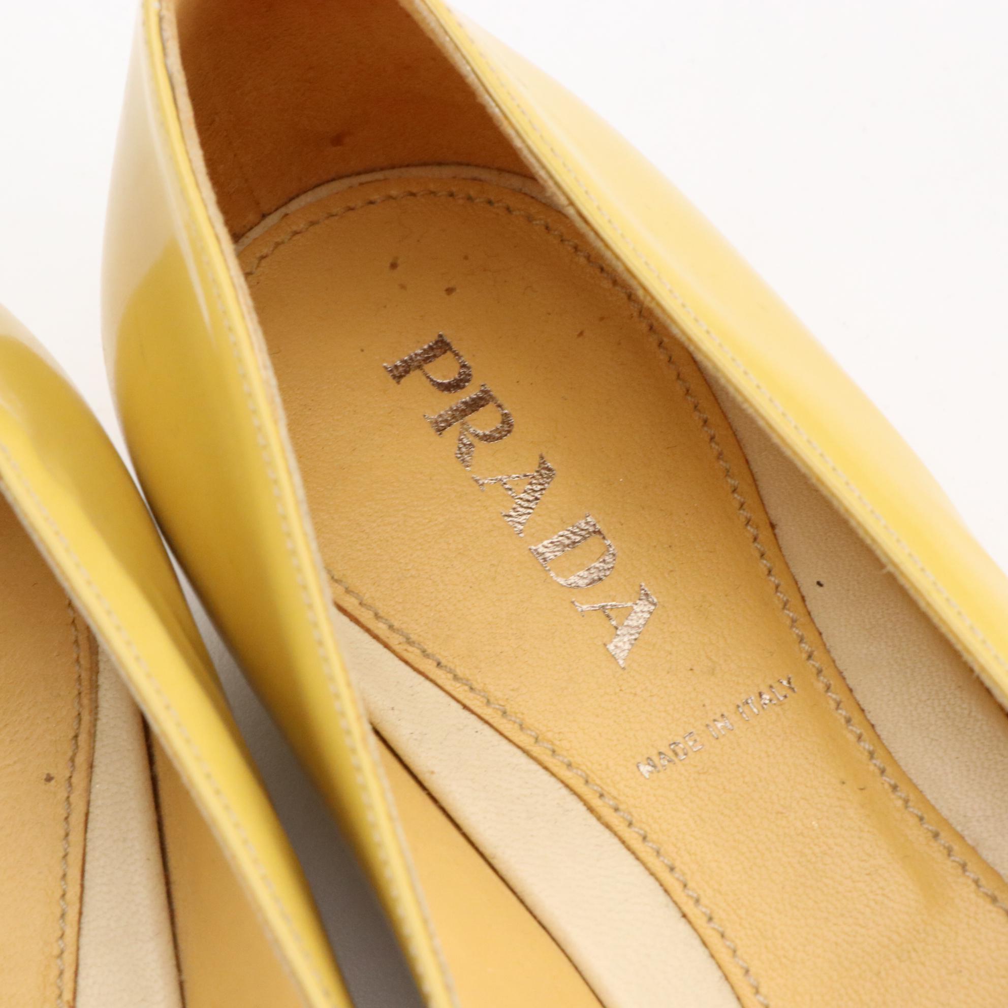 Prada Criss-Cross Detail Flats in Yellow Patent Leather