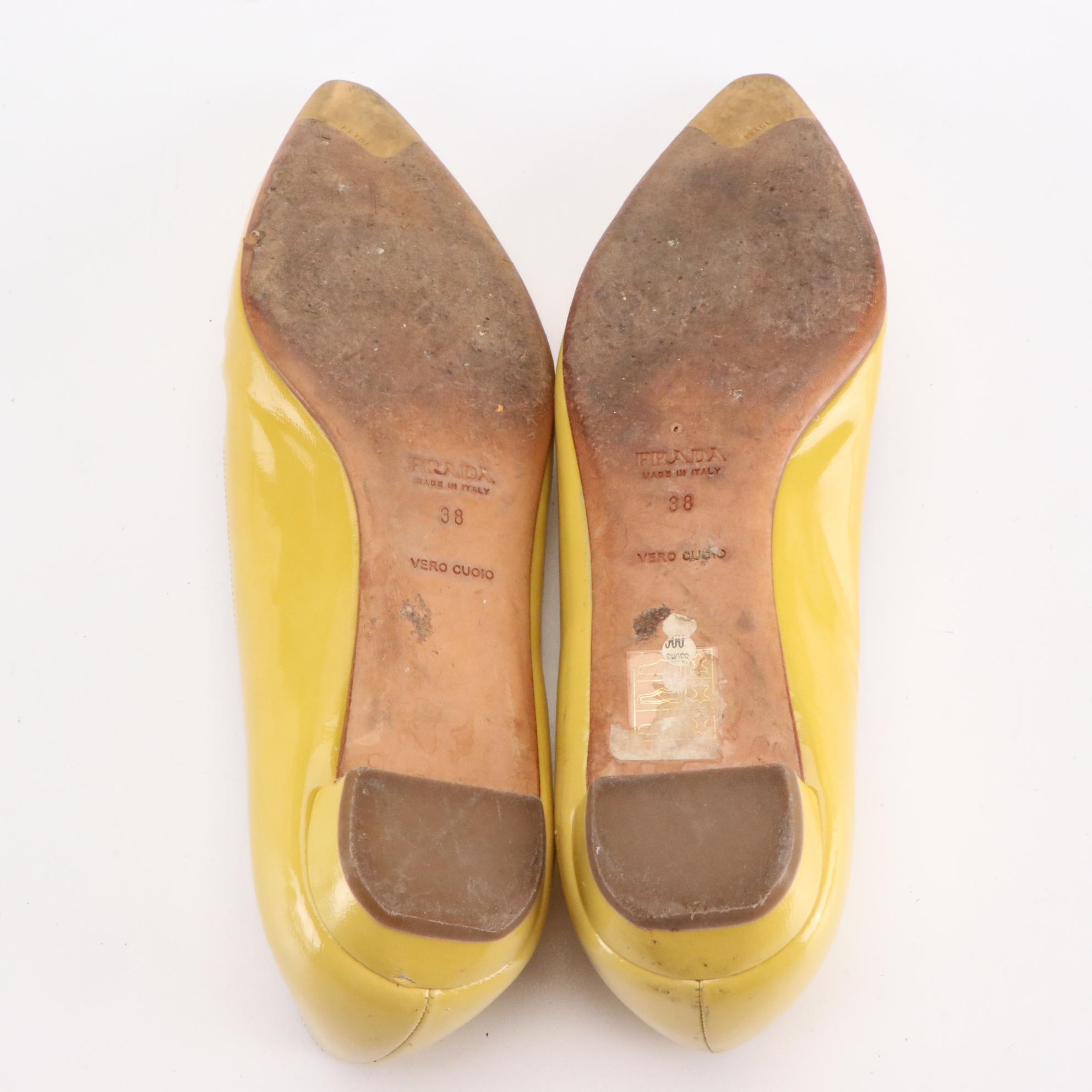Prada Criss-Cross Detail Flats in Yellow Patent Leather