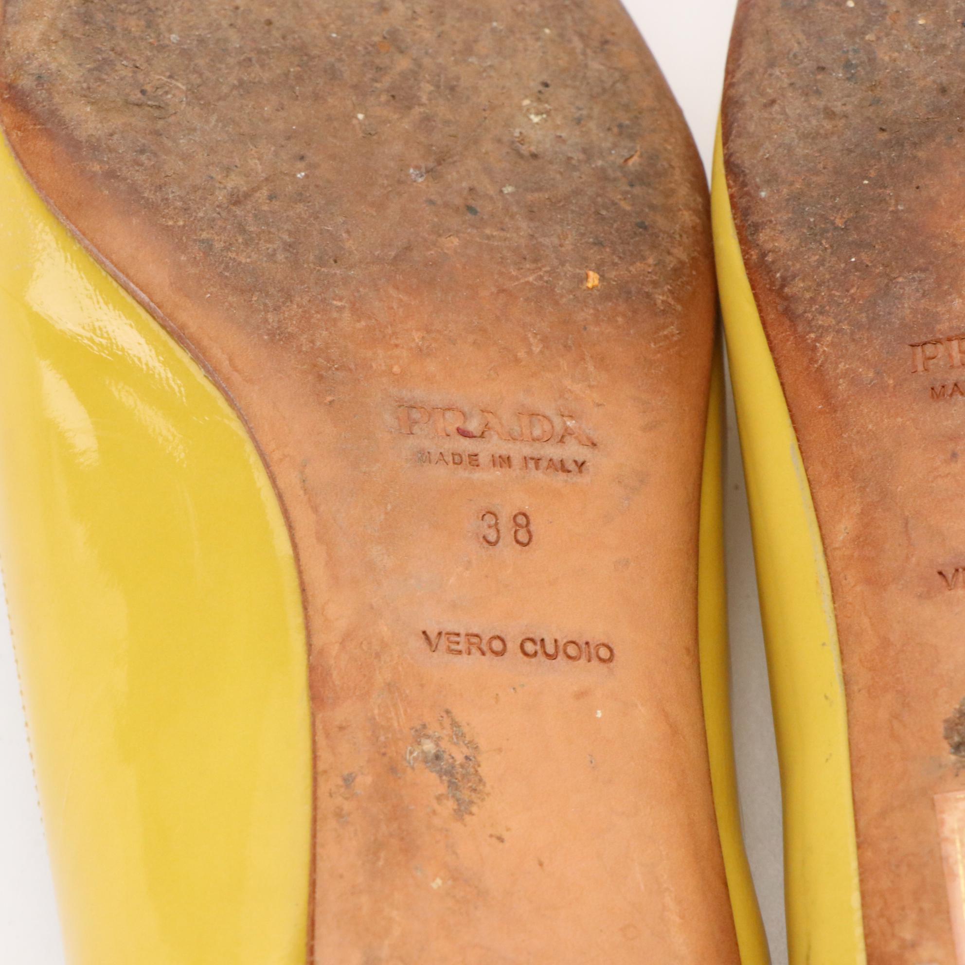 Prada Criss-Cross Detail Flats in Yellow Patent Leather