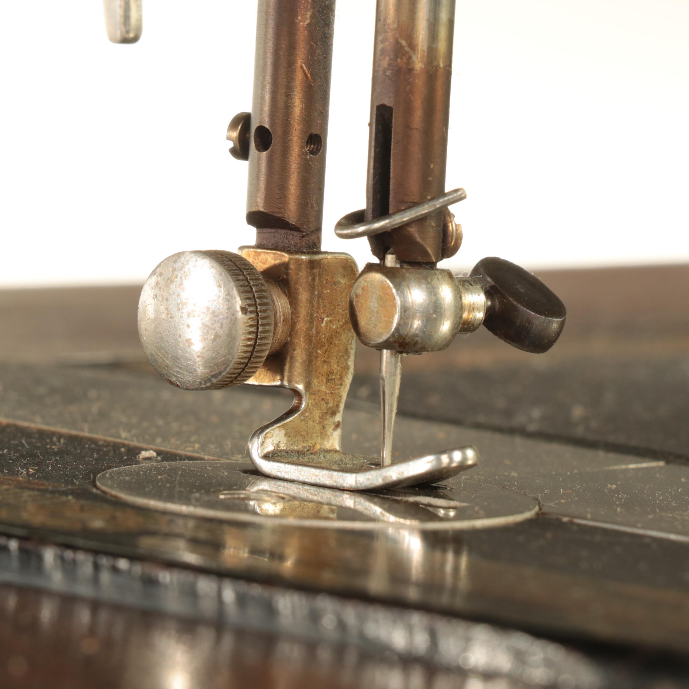 Franklin Egyptian Revival Decorated Treadle Sewing Machine in Oak Cabinet