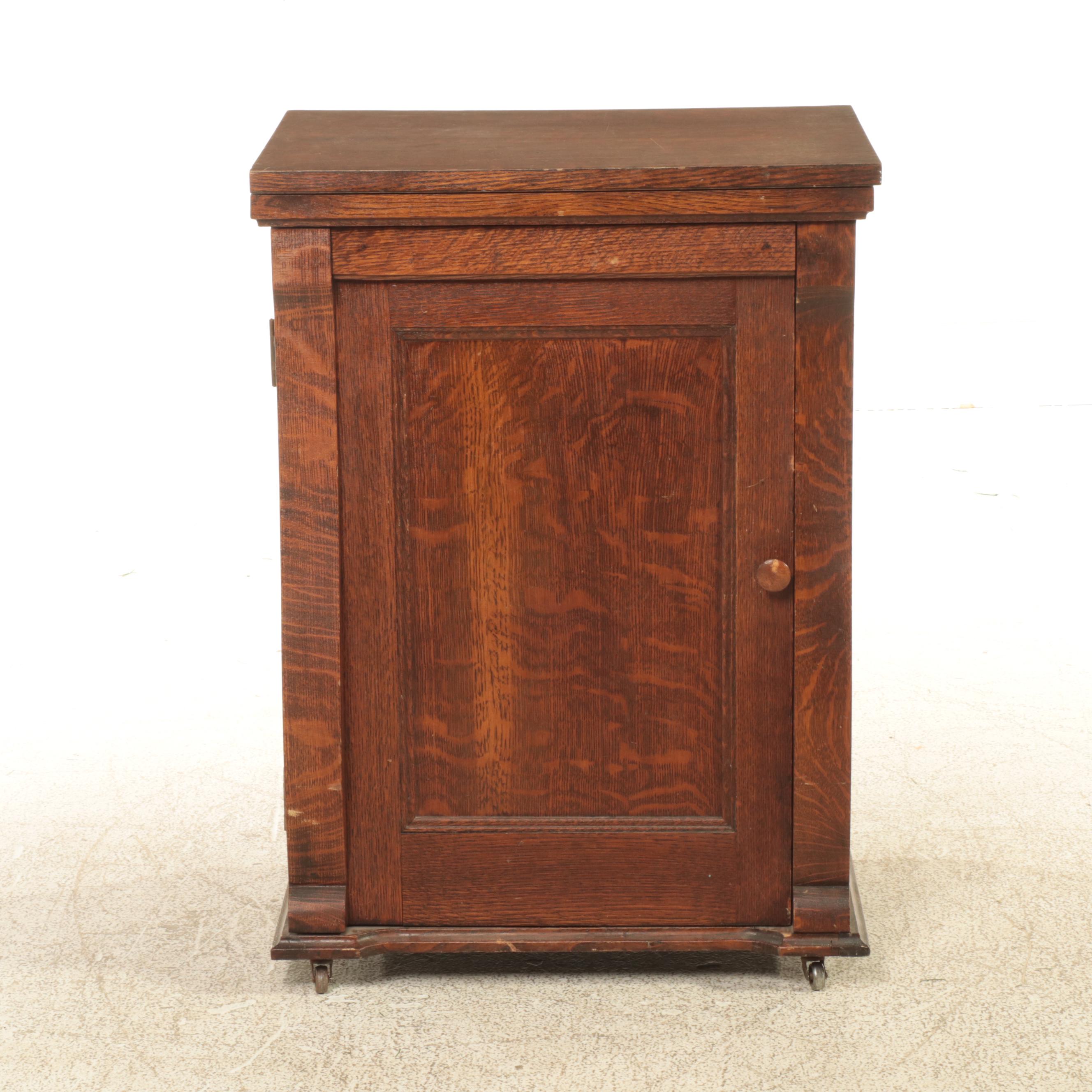 Franklin Egyptian Revival Decorated Treadle Sewing Machine in Oak Cabinet