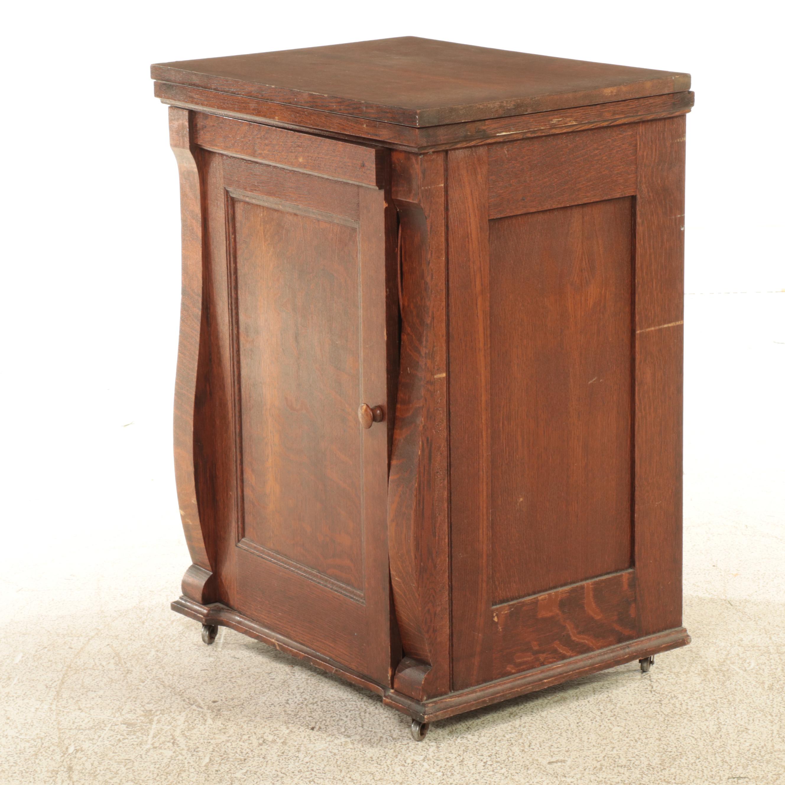 Franklin Egyptian Revival Decorated Treadle Sewing Machine in Oak Cabinet