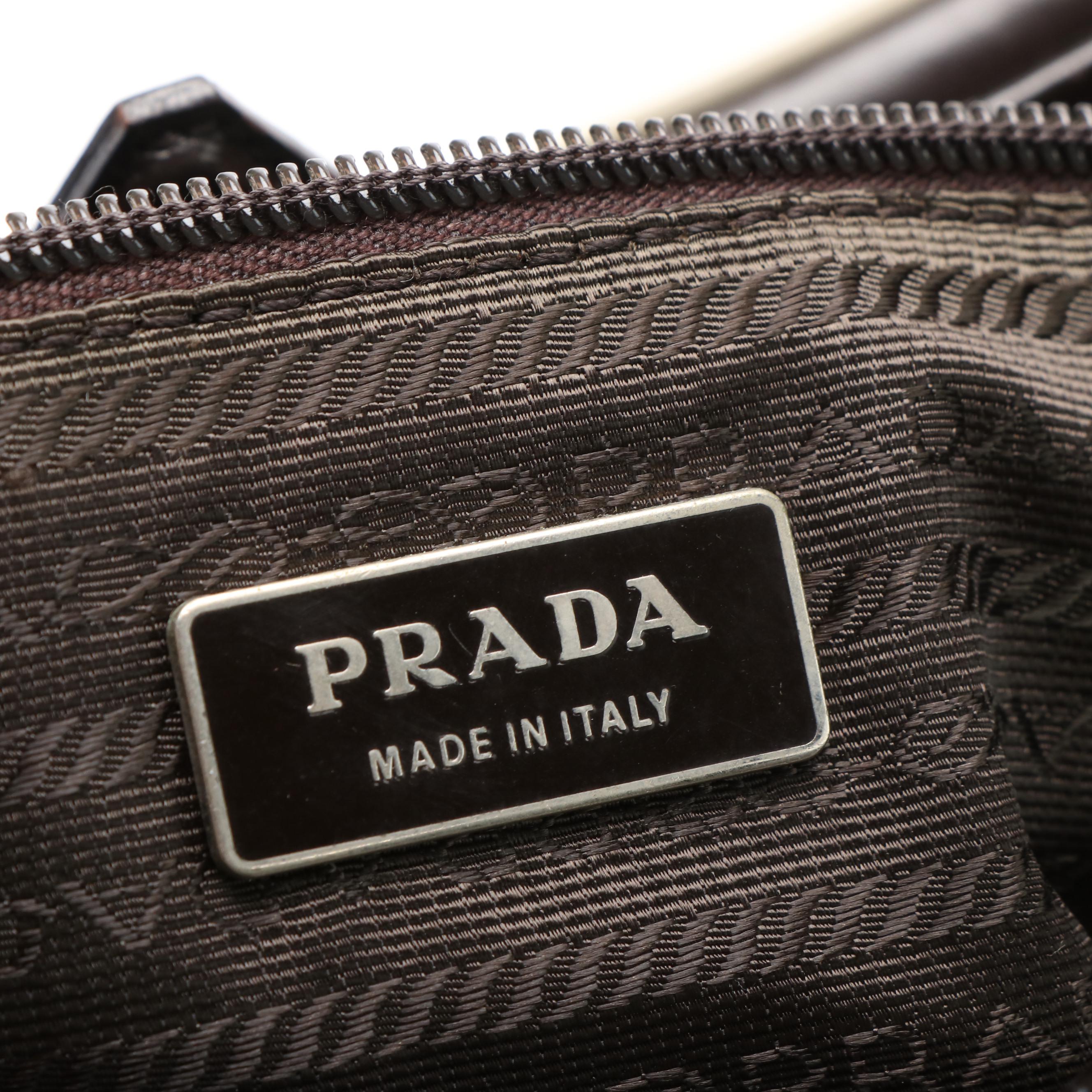 Prada  Box Frame Leather Kiss Lock Handbag