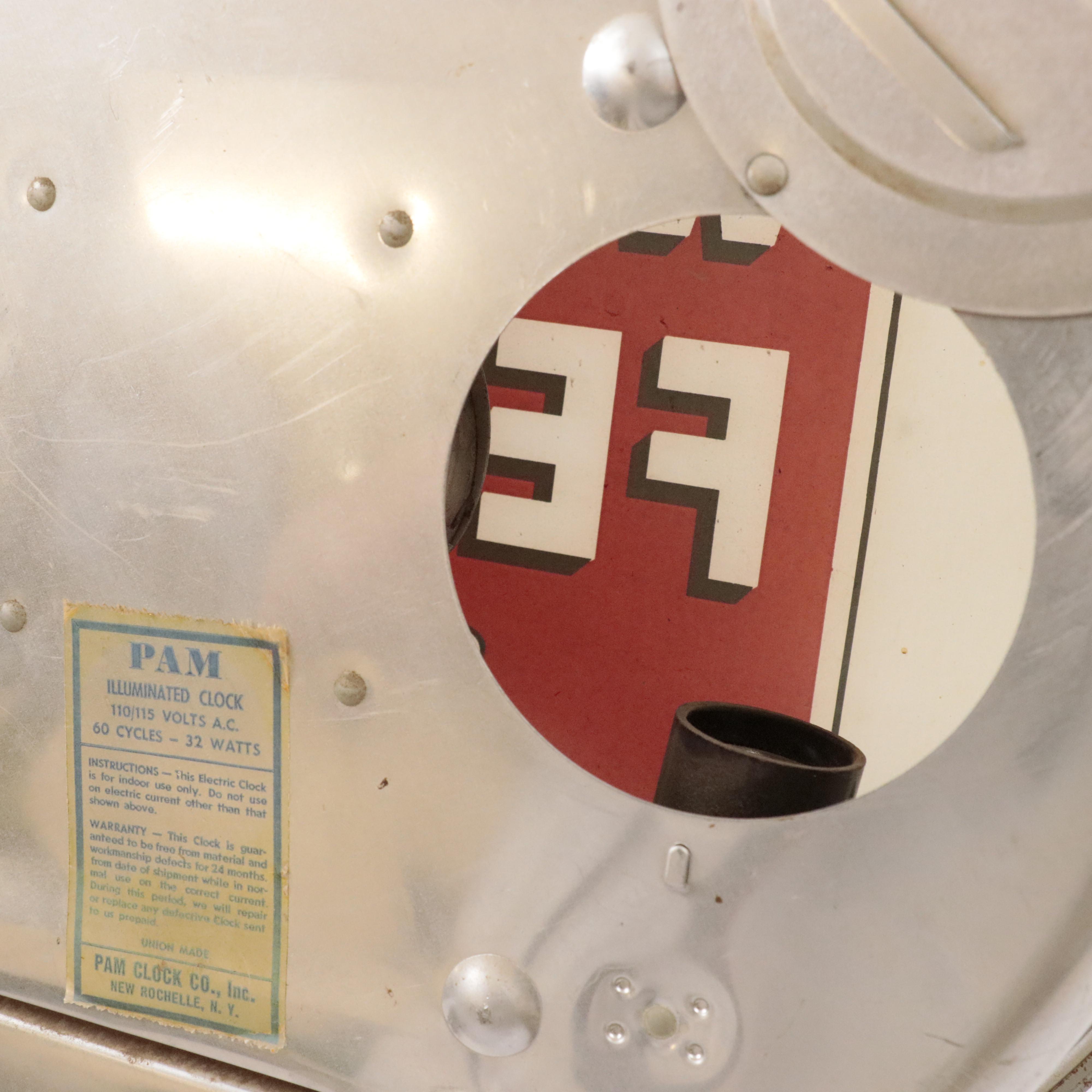 Pam Clock Co. Illuminated "Wayne Feeds" Wall Clock, Mid-20th Century Clocks