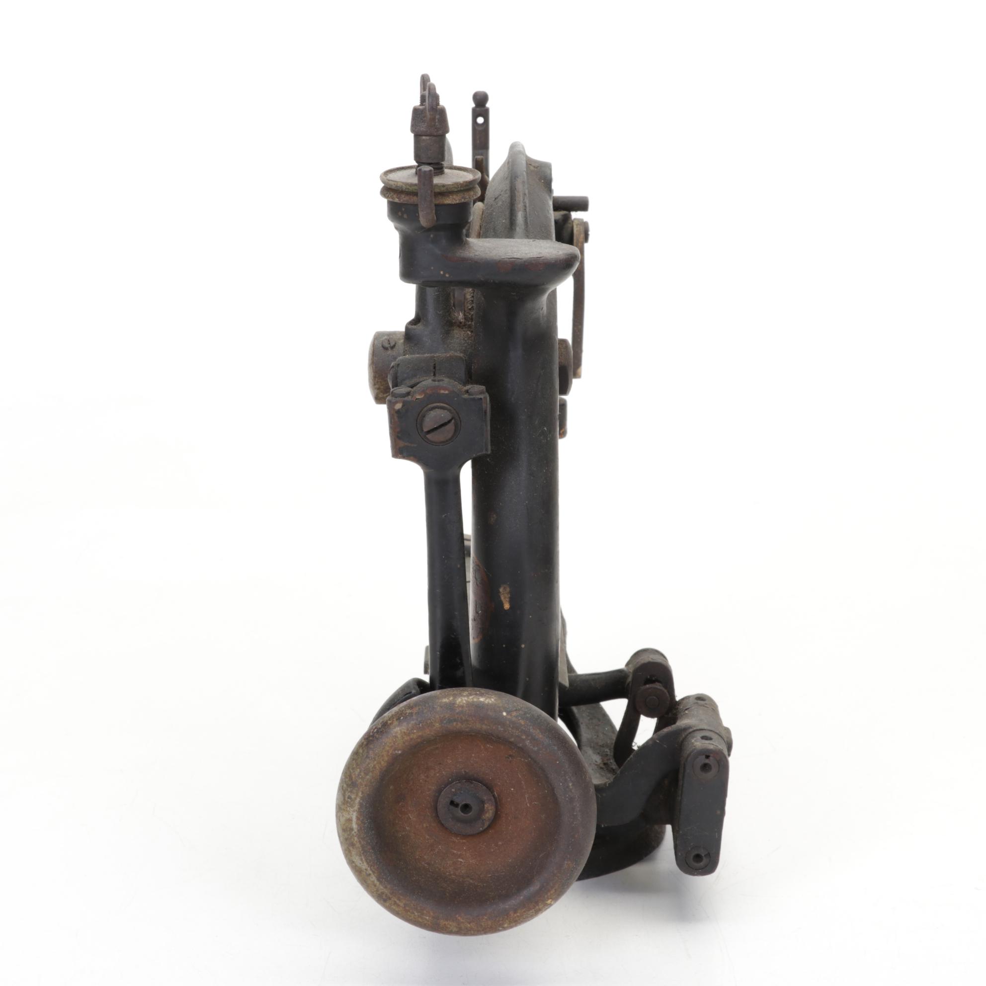 Bulasky Cast Iron Millinery Sewing Machine and Textiles