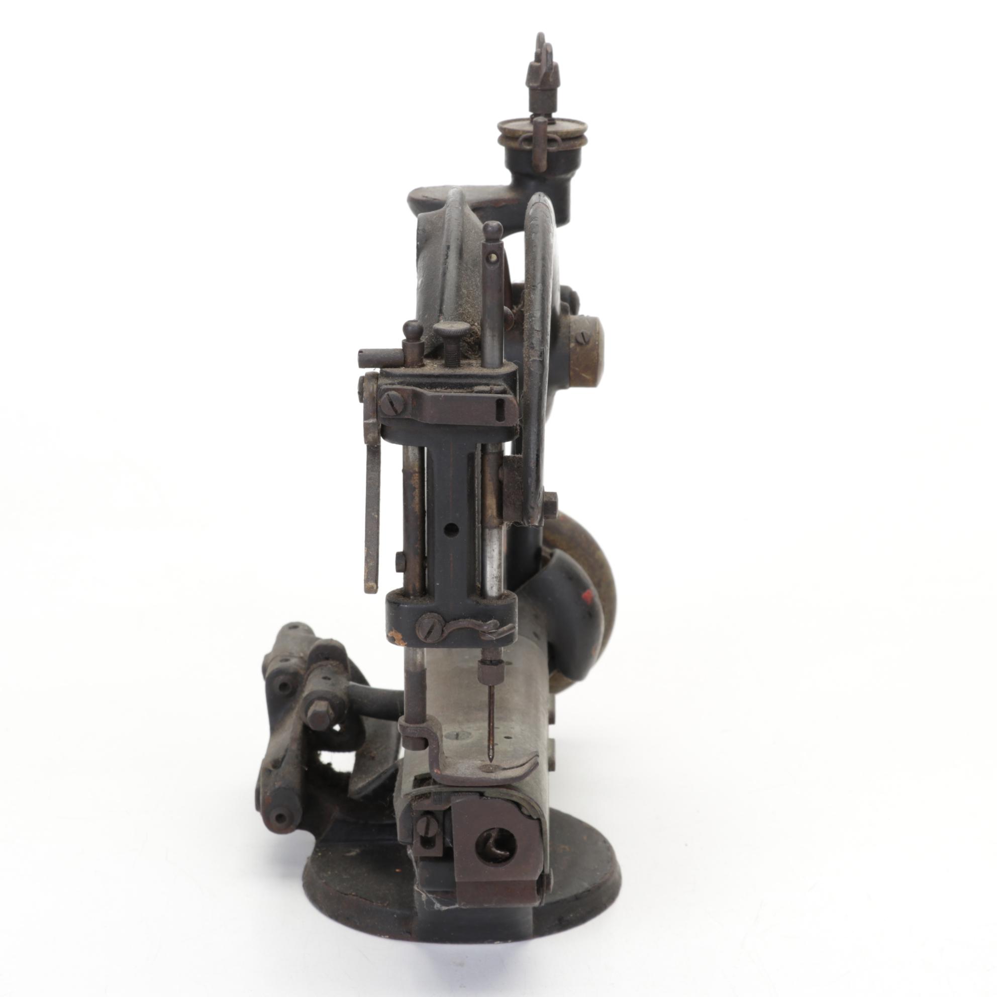 Bulasky Cast Iron Millinery Sewing Machine and Textiles