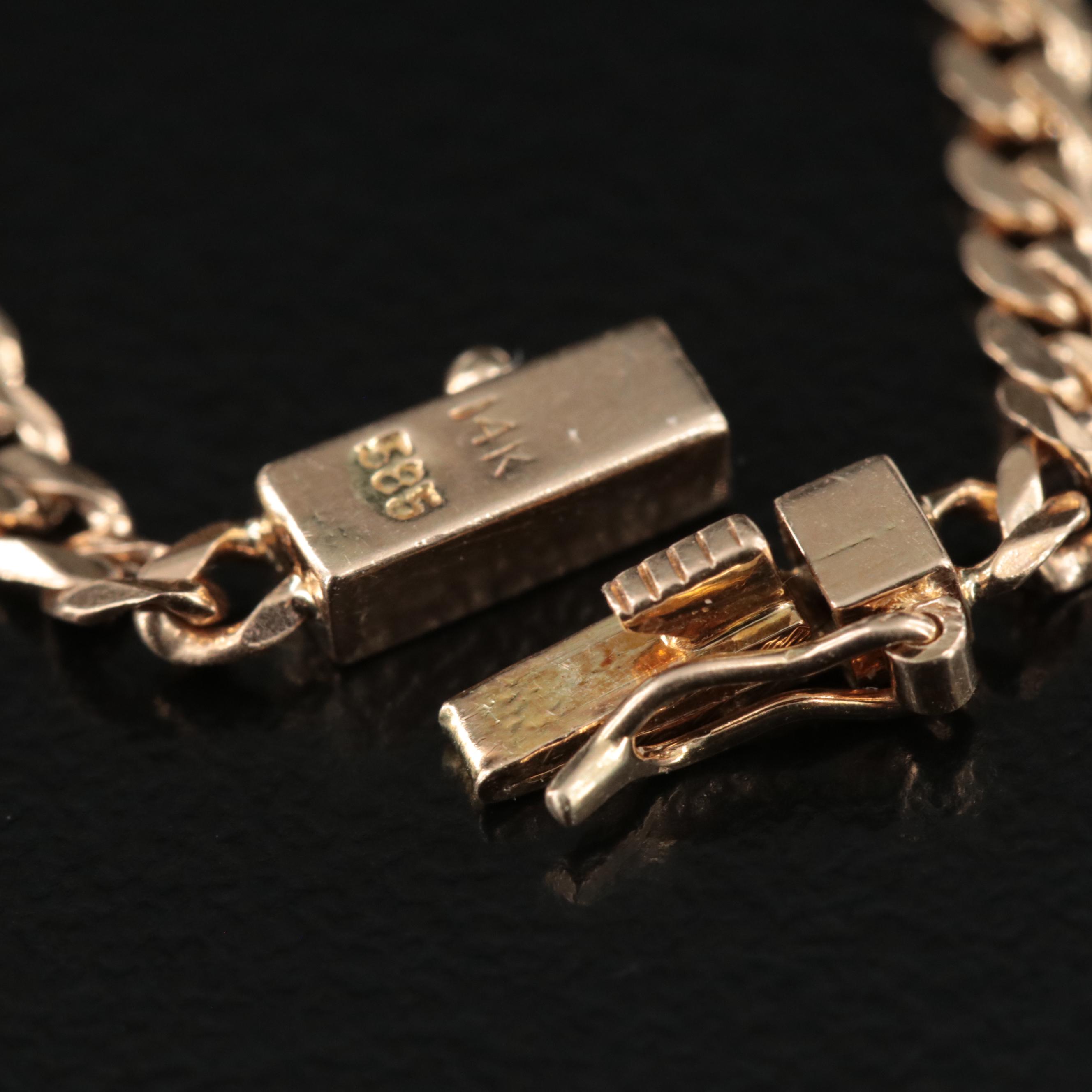 14K Alternating Emerald and 0.12 CTW Diamond Bracelet