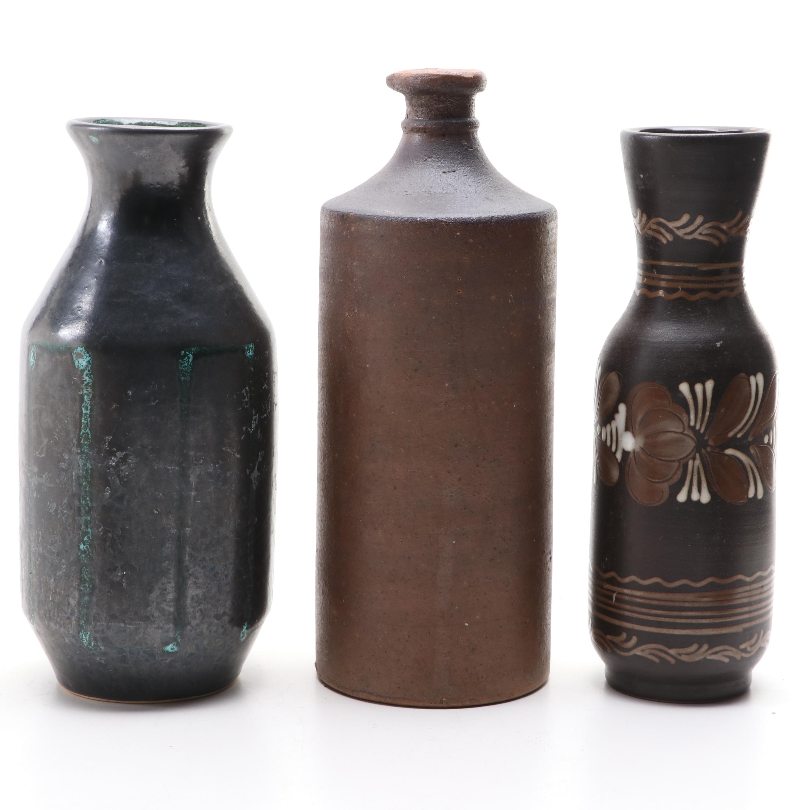 Bottle Form Vase with Other Glazed Vases and Planters
