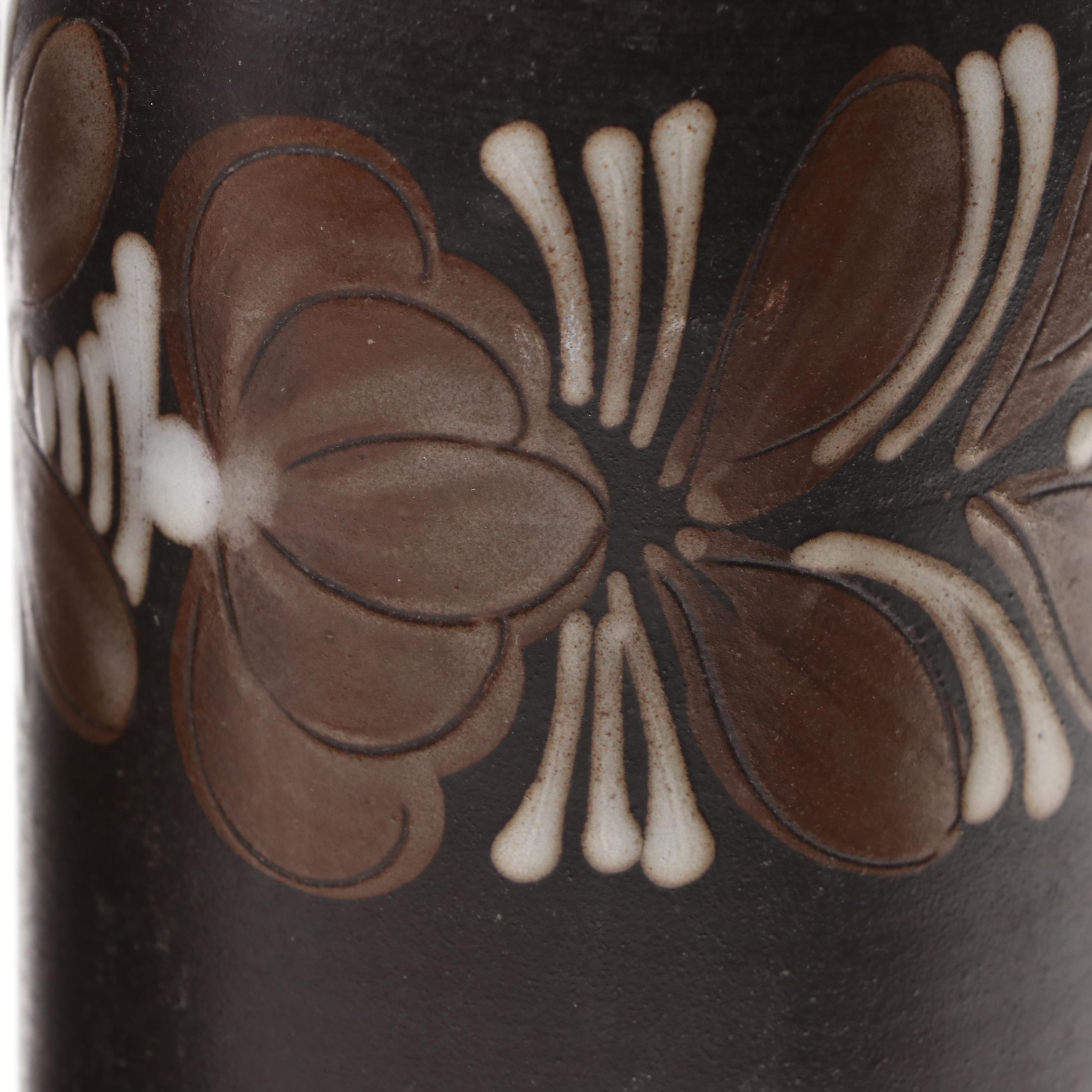 Bottle Form Vase with Other Glazed Vases and Planters