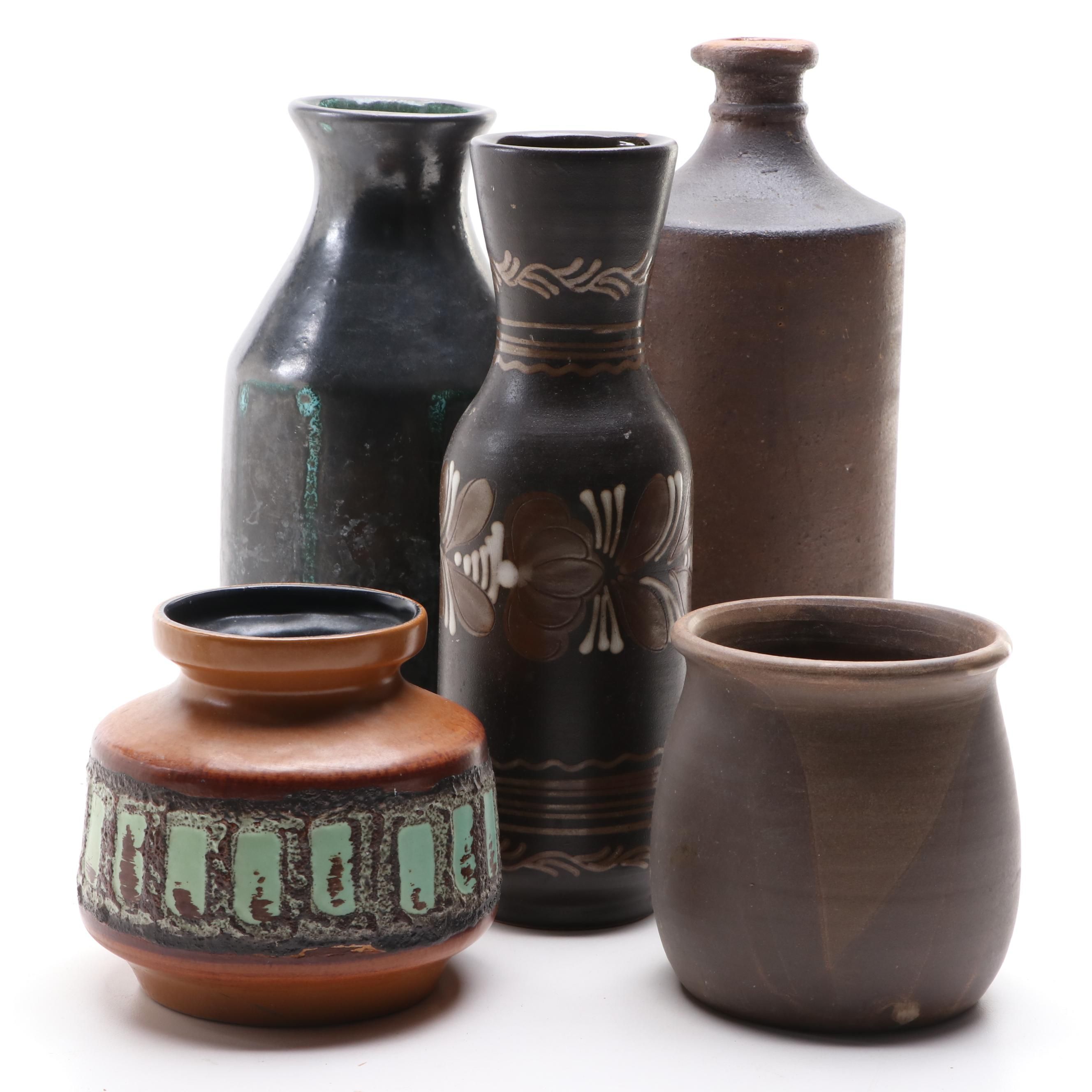 Bottle Form Vase with Other Glazed Vases and Planters