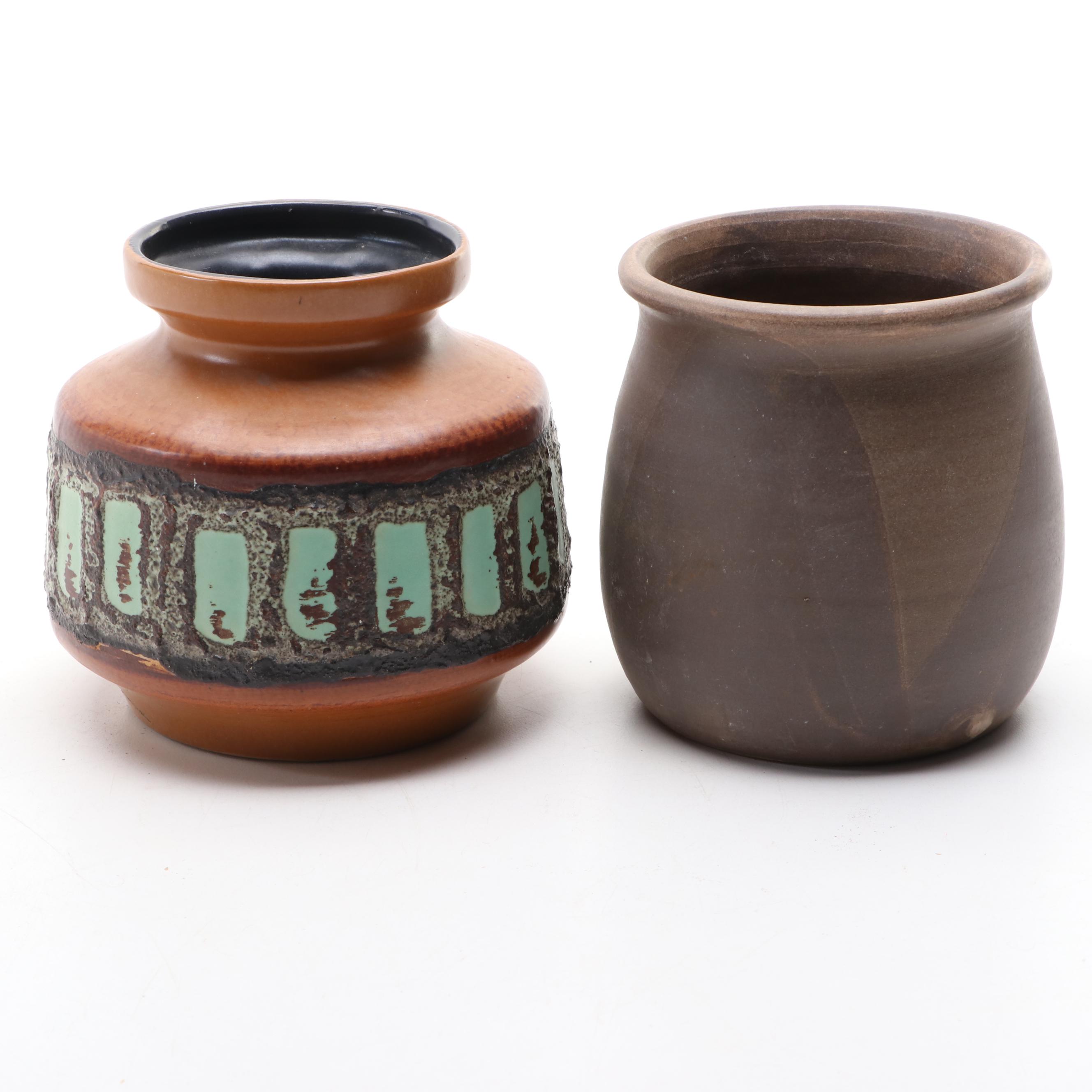 Bottle Form Vase with Other Glazed Vases and Planters