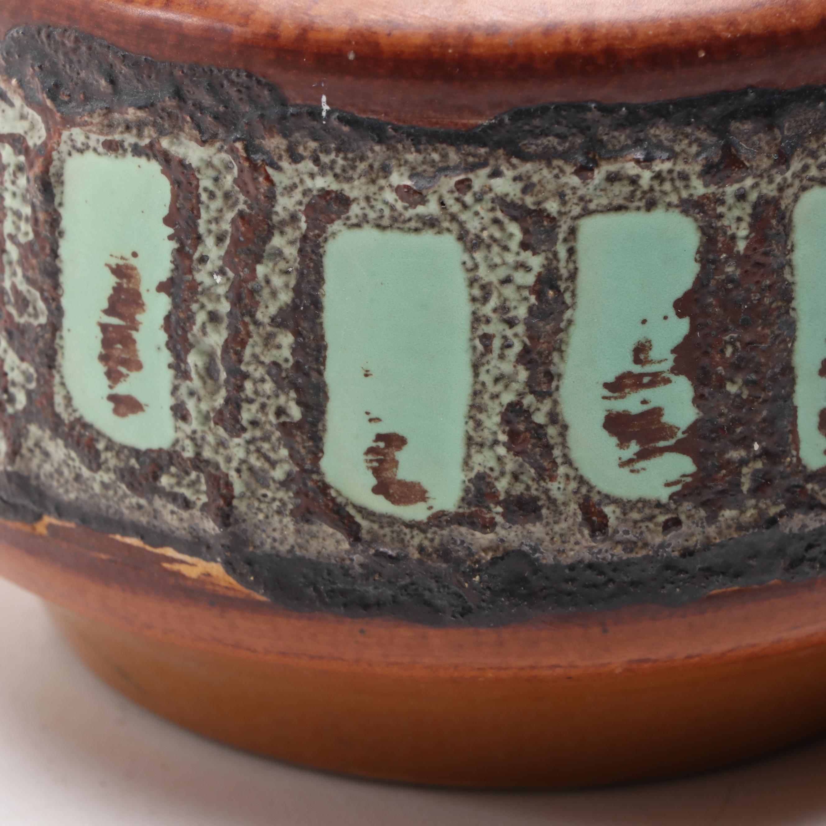 Bottle Form Vase with Other Glazed Vases and Planters