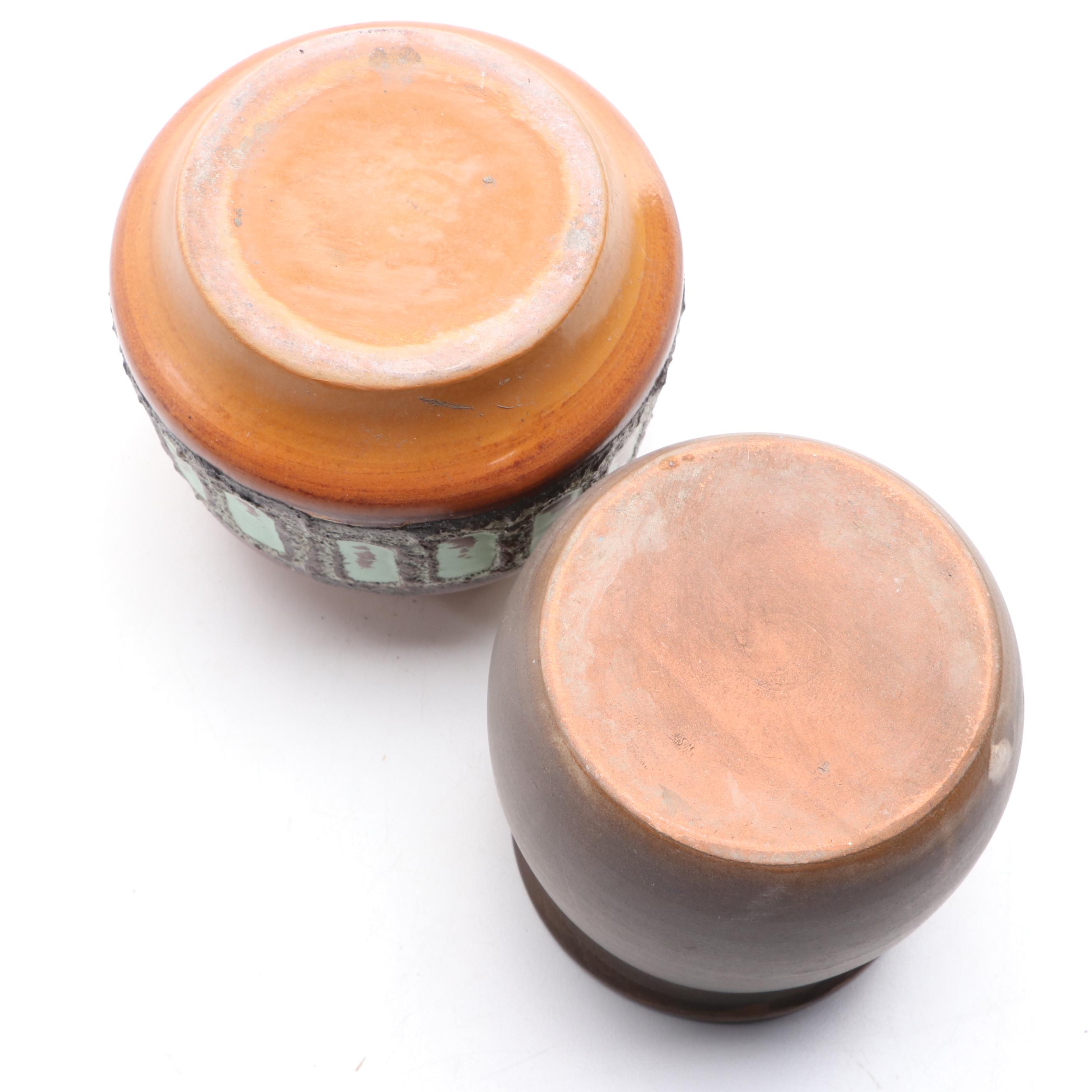 Bottle Form Vase with Other Glazed Vases and Planters