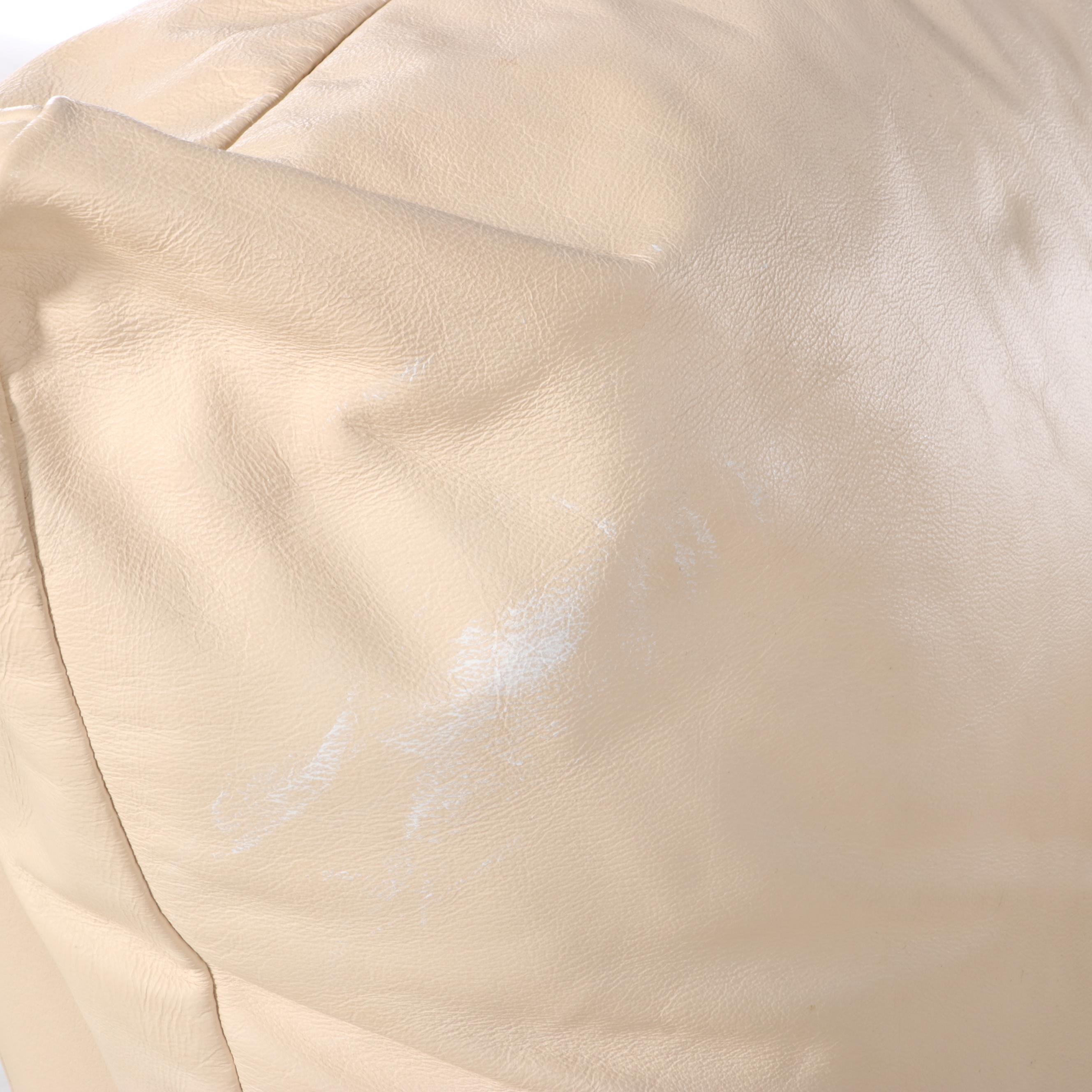 Cream Leather Upholstered Swivel Armchair