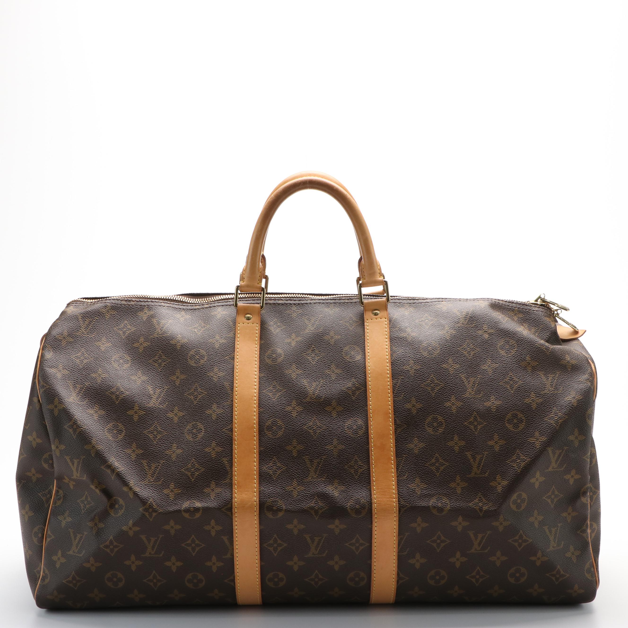 Louis Vuitton Keepall 55 in Brown Monogram Coated Canvas with Leather Trim