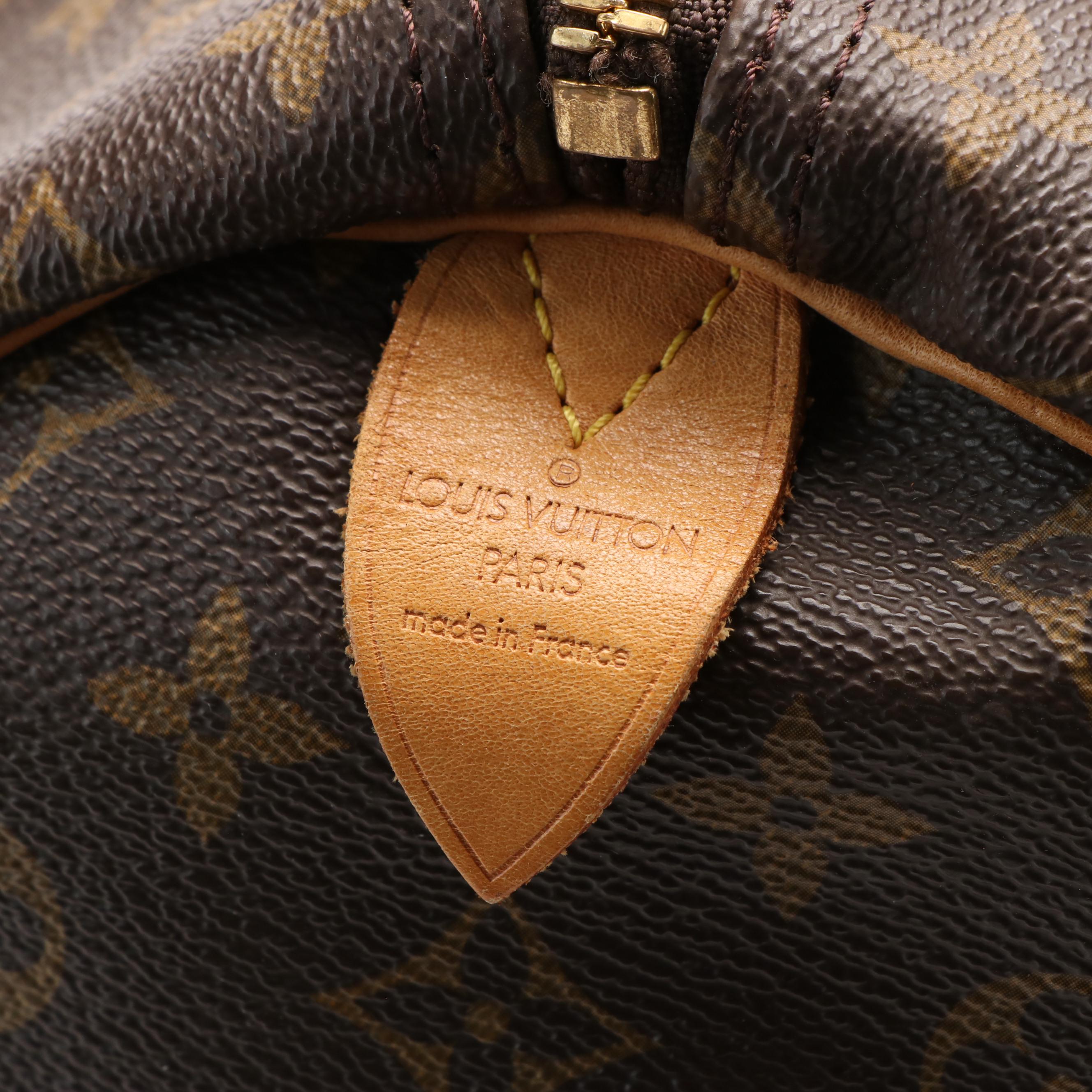 Louis Vuitton Keepall 55 in Brown Monogram Coated Canvas with Leather Trim