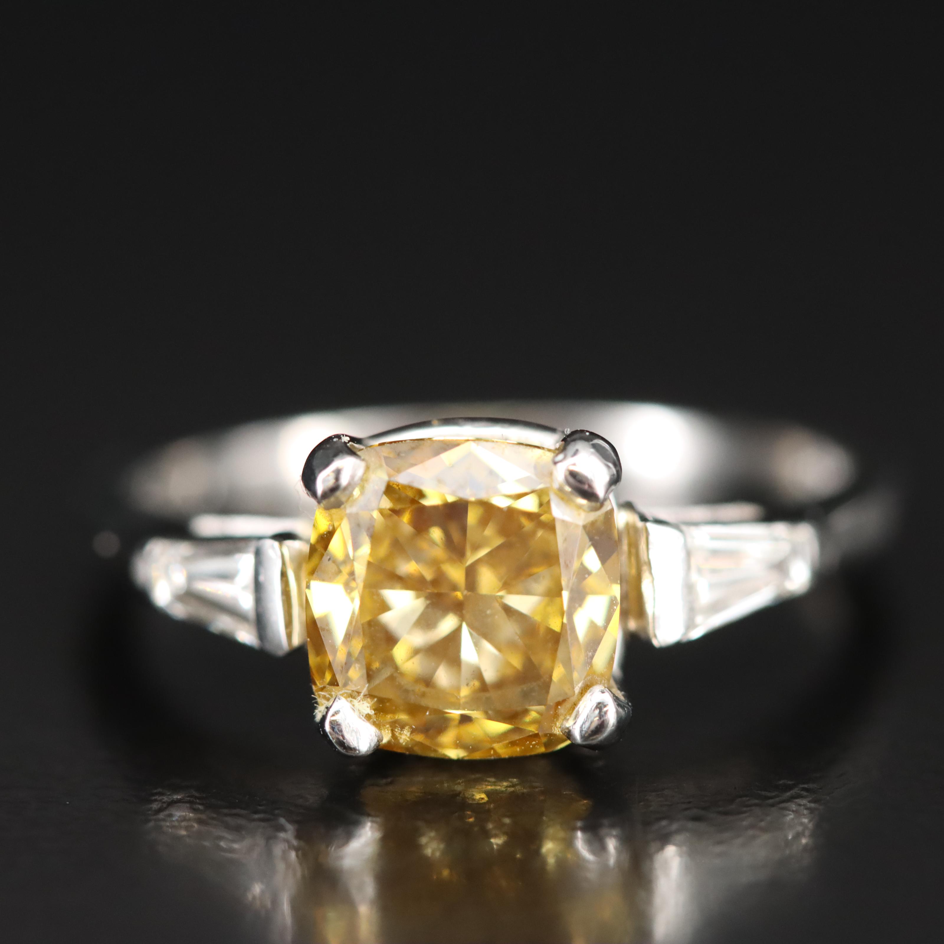 2.50 CTW Diamond Ring with (Origin Undetermined) Fancy Dark Yellow Center